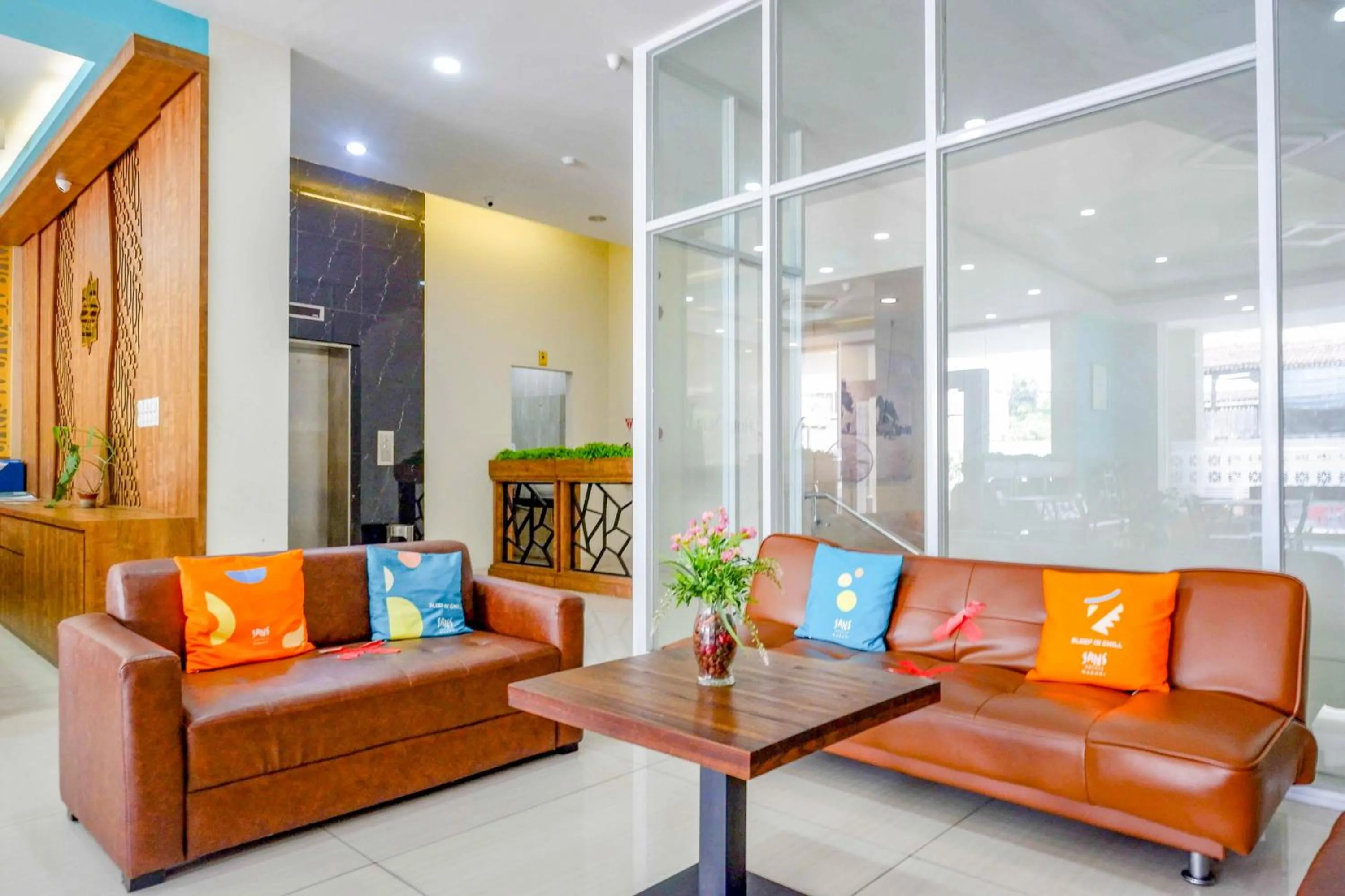 Seating area in Sans Hotel Nagari Malioboro