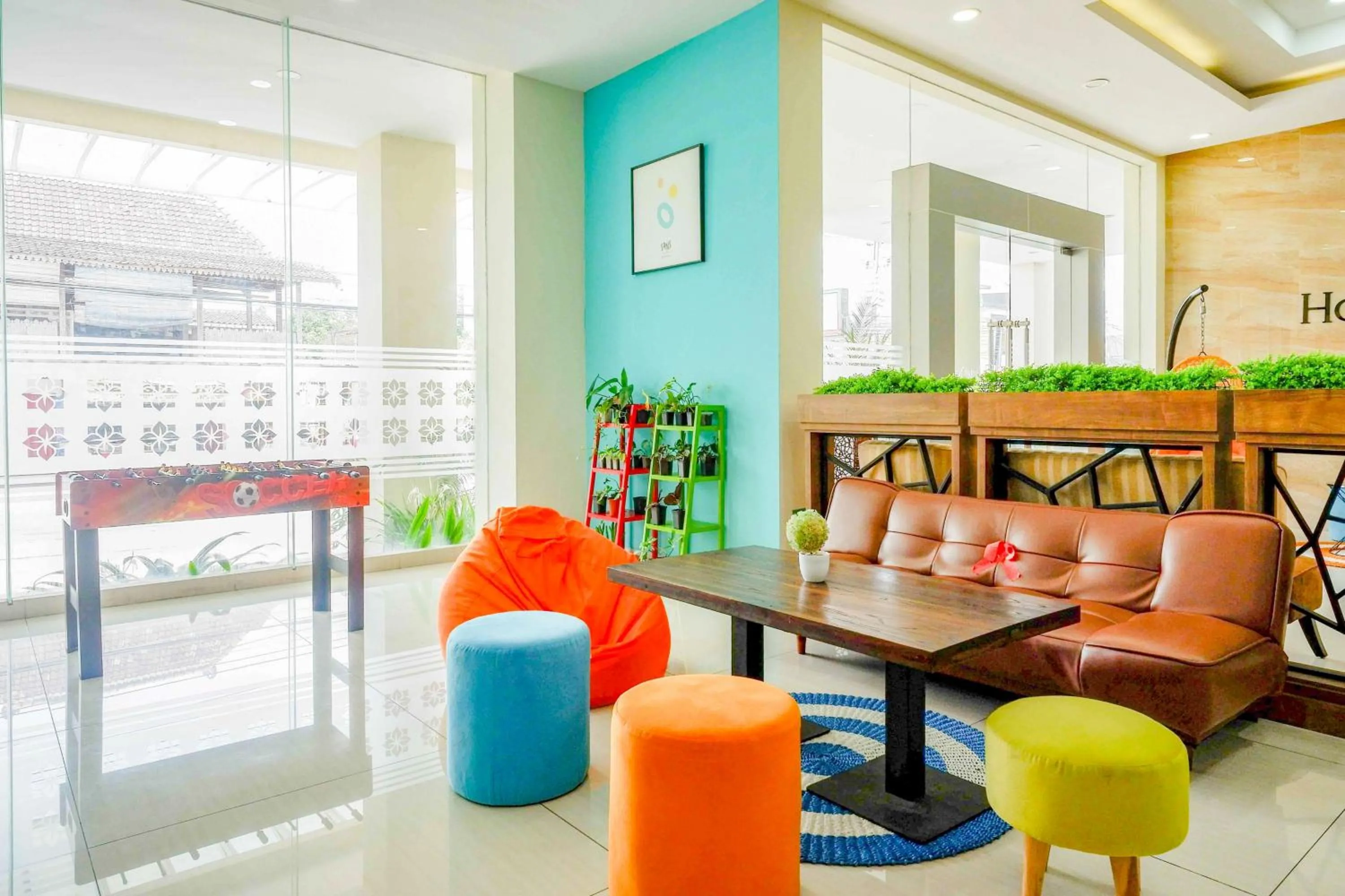 Seating area in Sans Hotel Nagari Malioboro