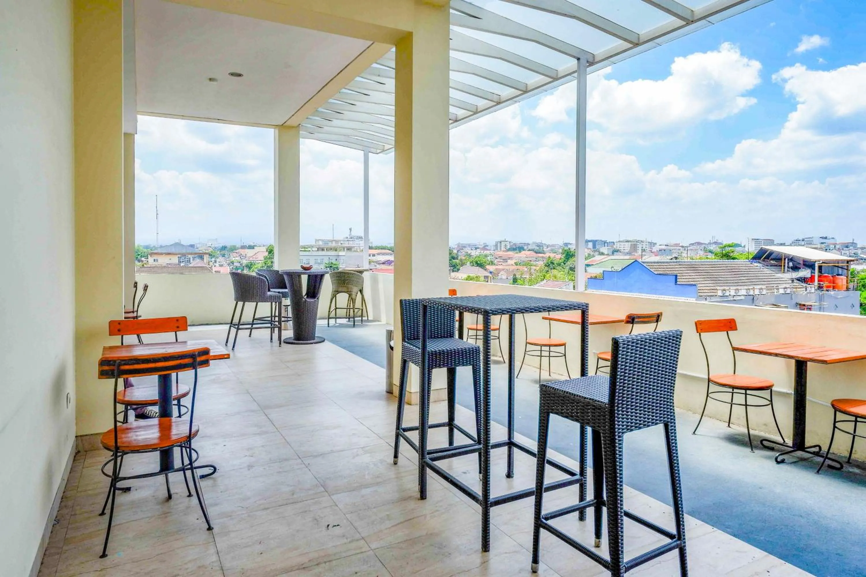 Seating area in Sans Hotel Nagari Malioboro