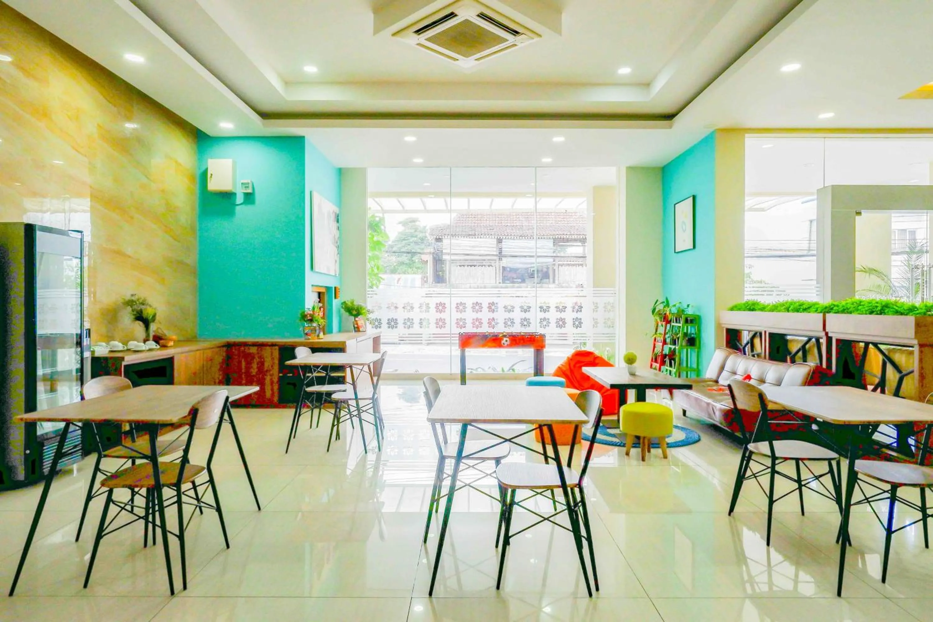 Seating area in Sans Hotel Nagari Malioboro