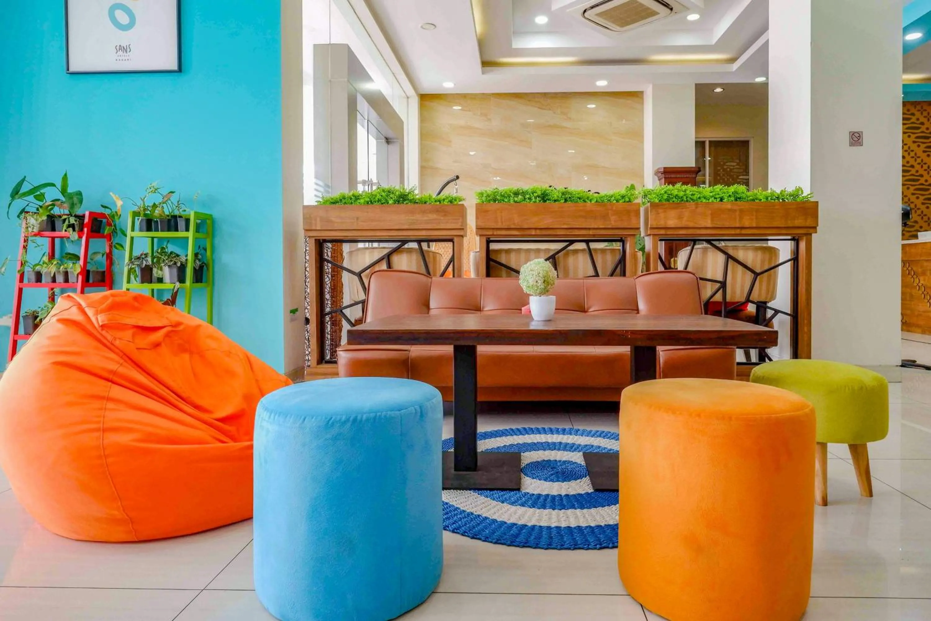 Seating area in Sans Hotel Nagari Malioboro