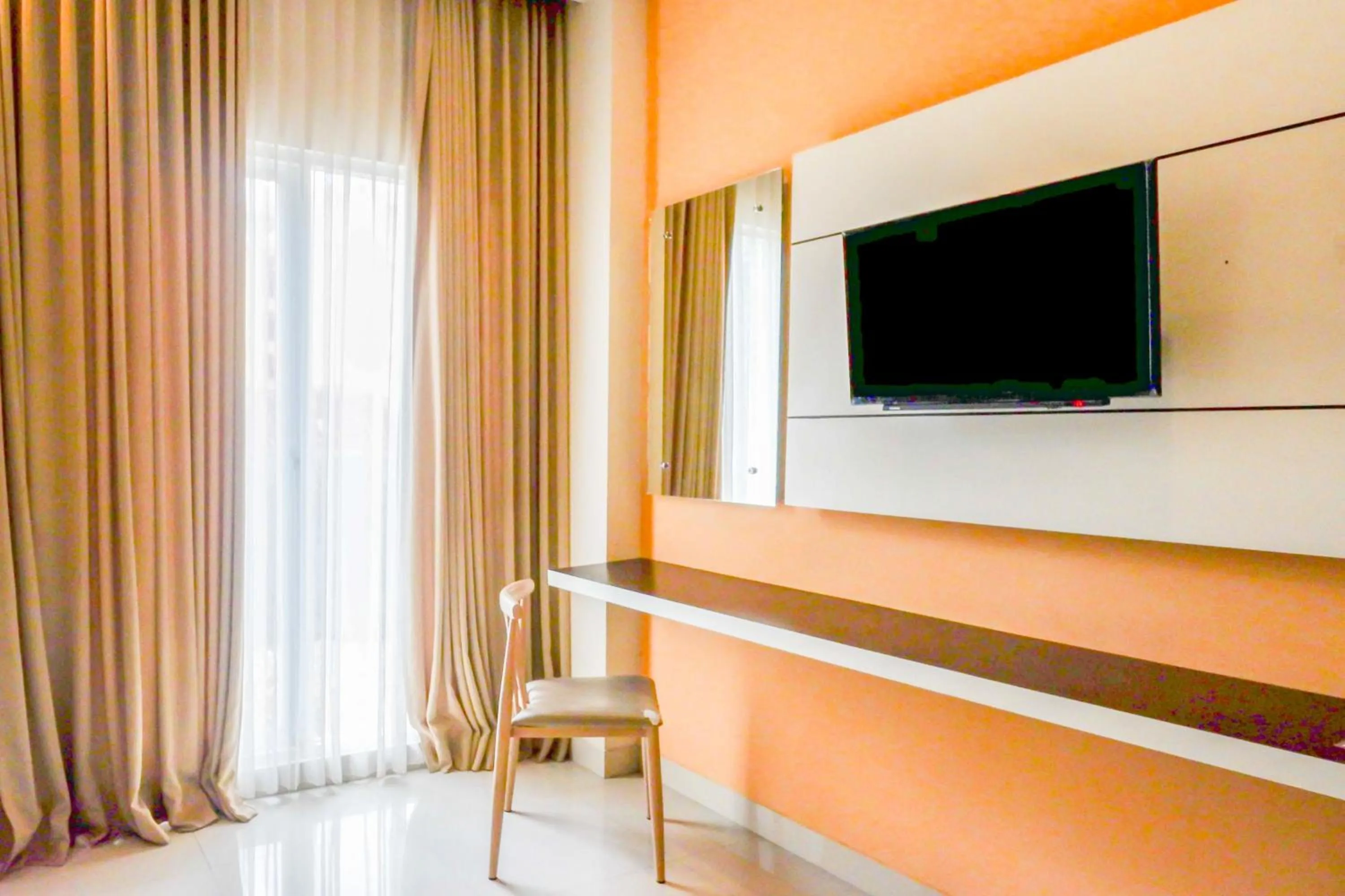 TV and multimedia in Sans Hotel Nagari Malioboro