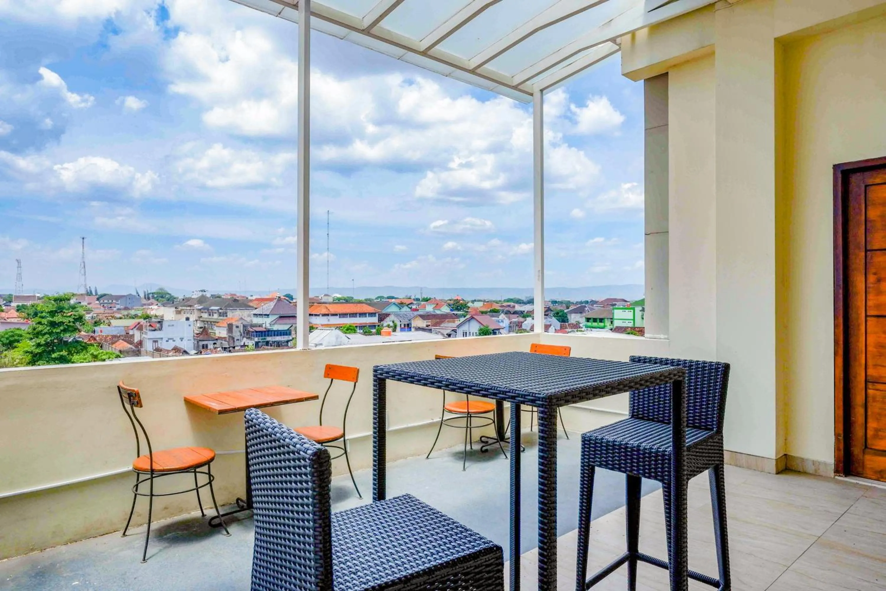 Seating area in Sans Hotel Nagari Malioboro