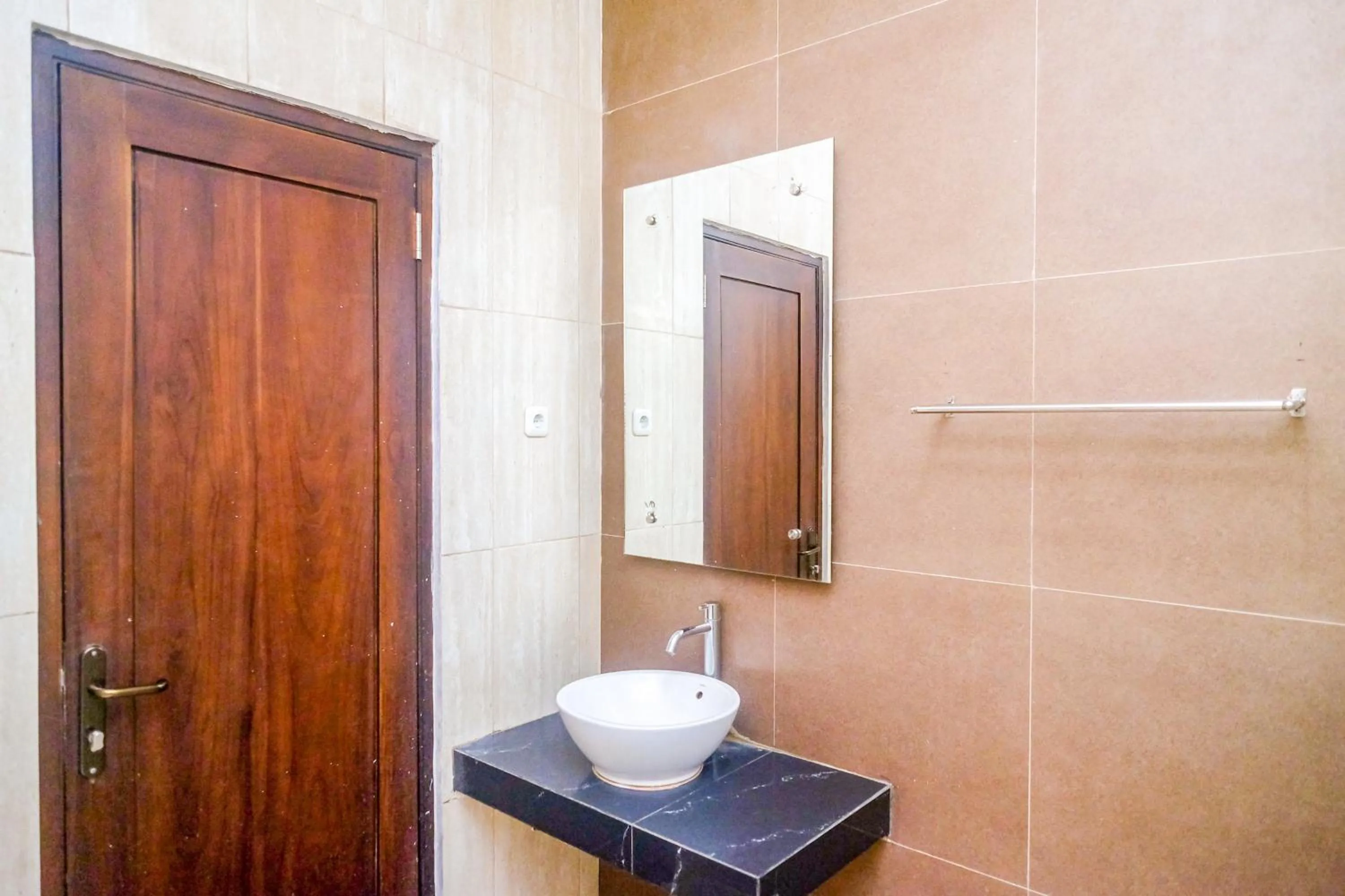 Bathroom in Sans Hotel Nagari Malioboro