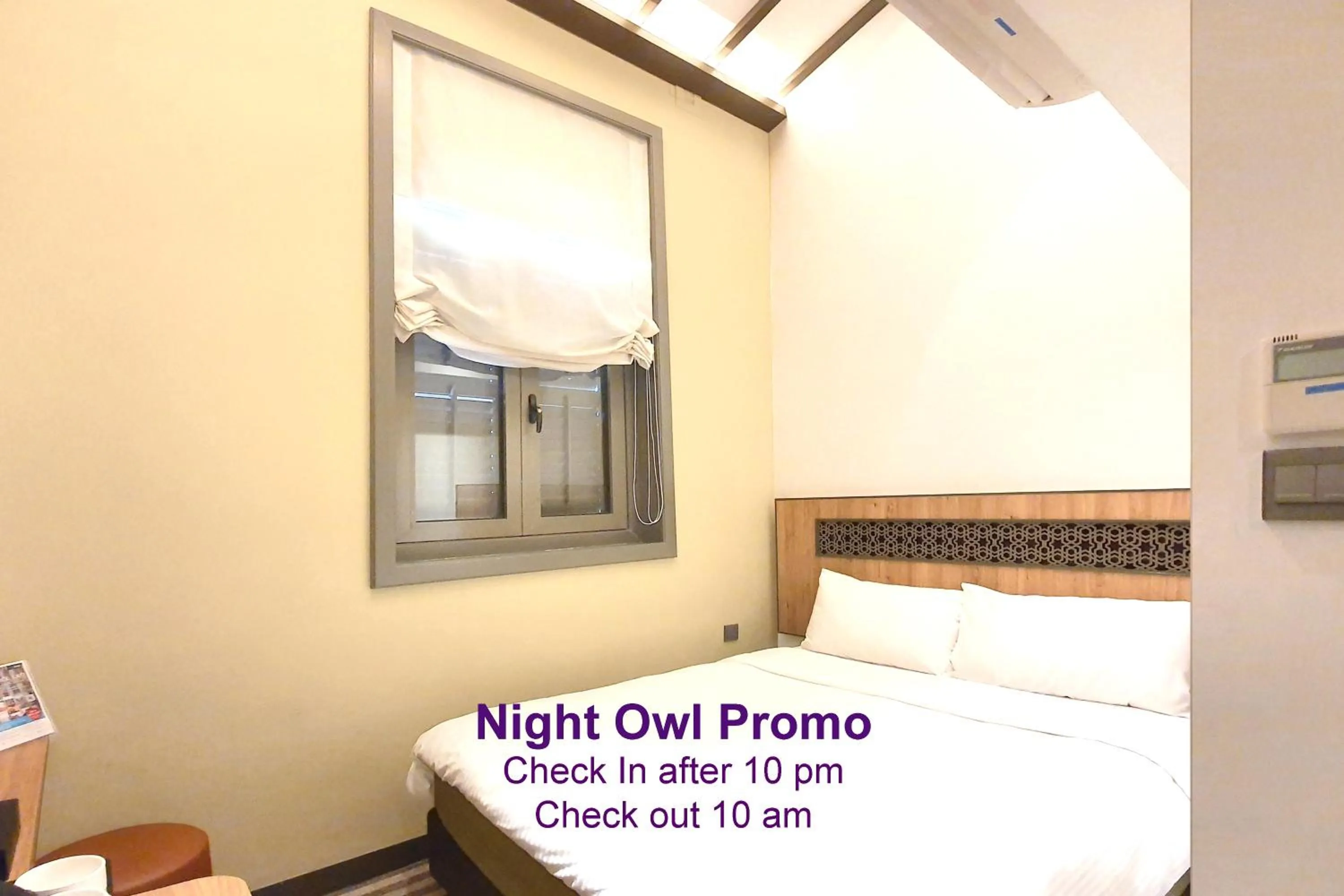 Bedroom in Aqueen Heritage Hotel Little India