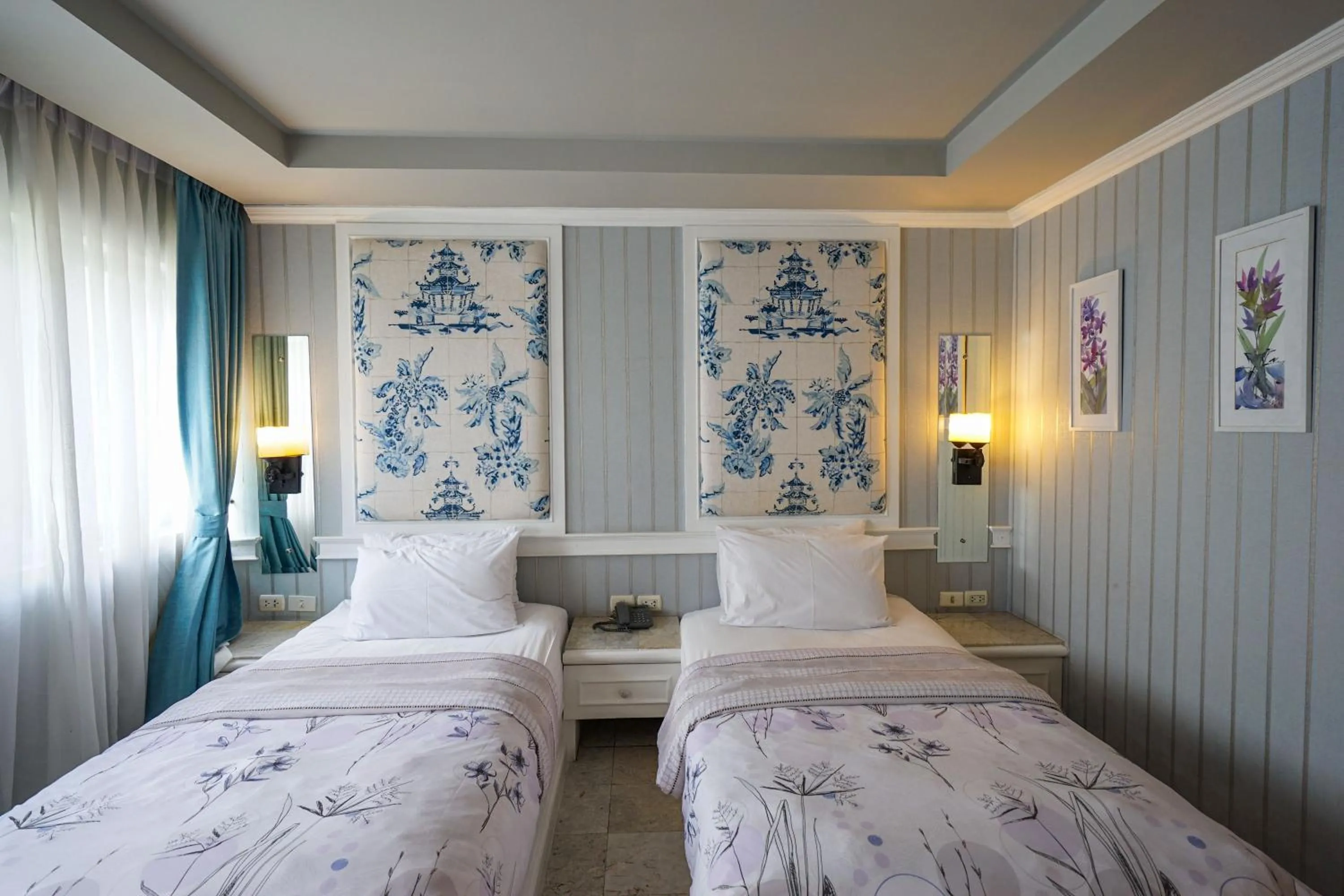 Bed in At Pingnakorn Nimman Hotel