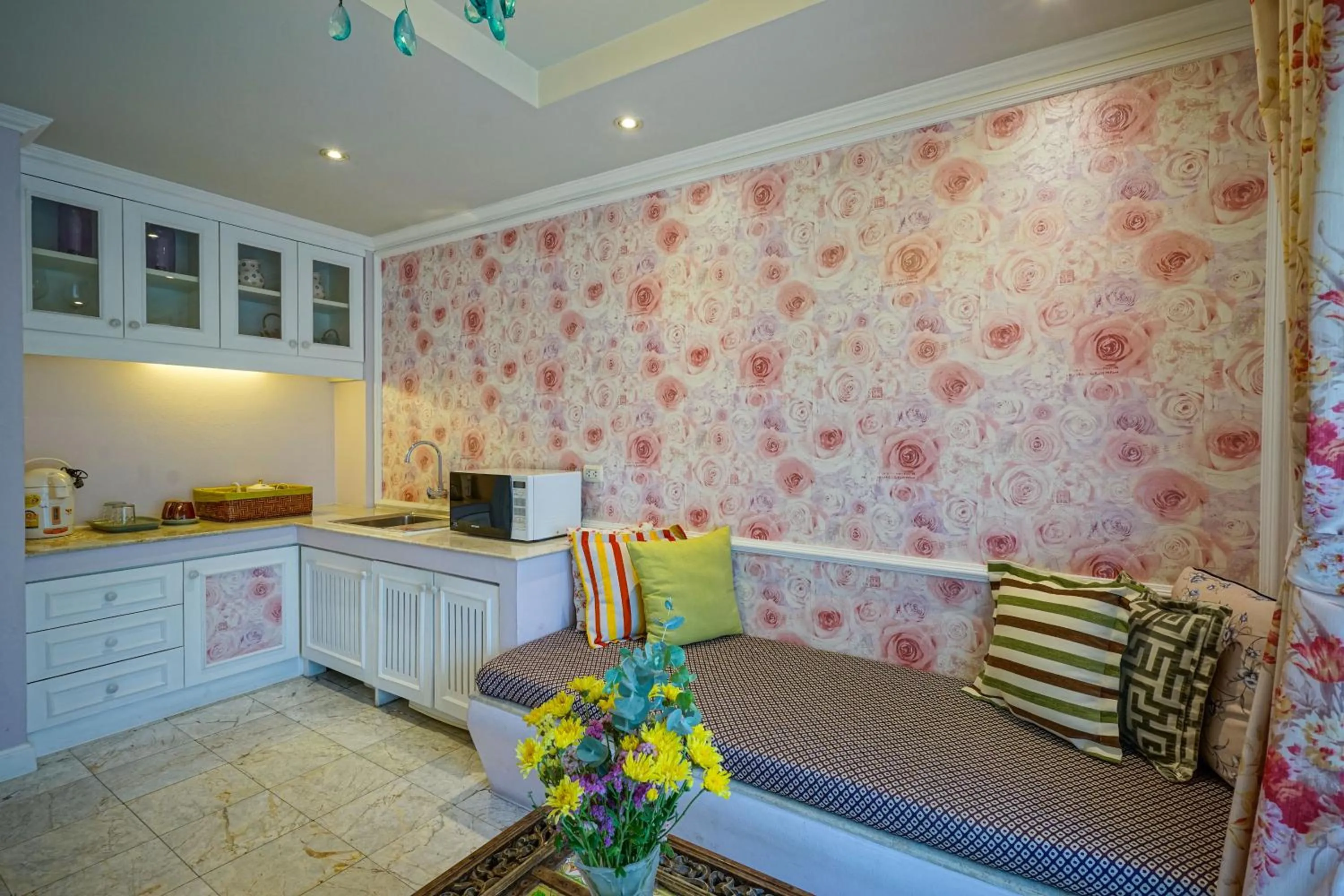 Living room, Bed in At Pingnakorn Nimman Hotel