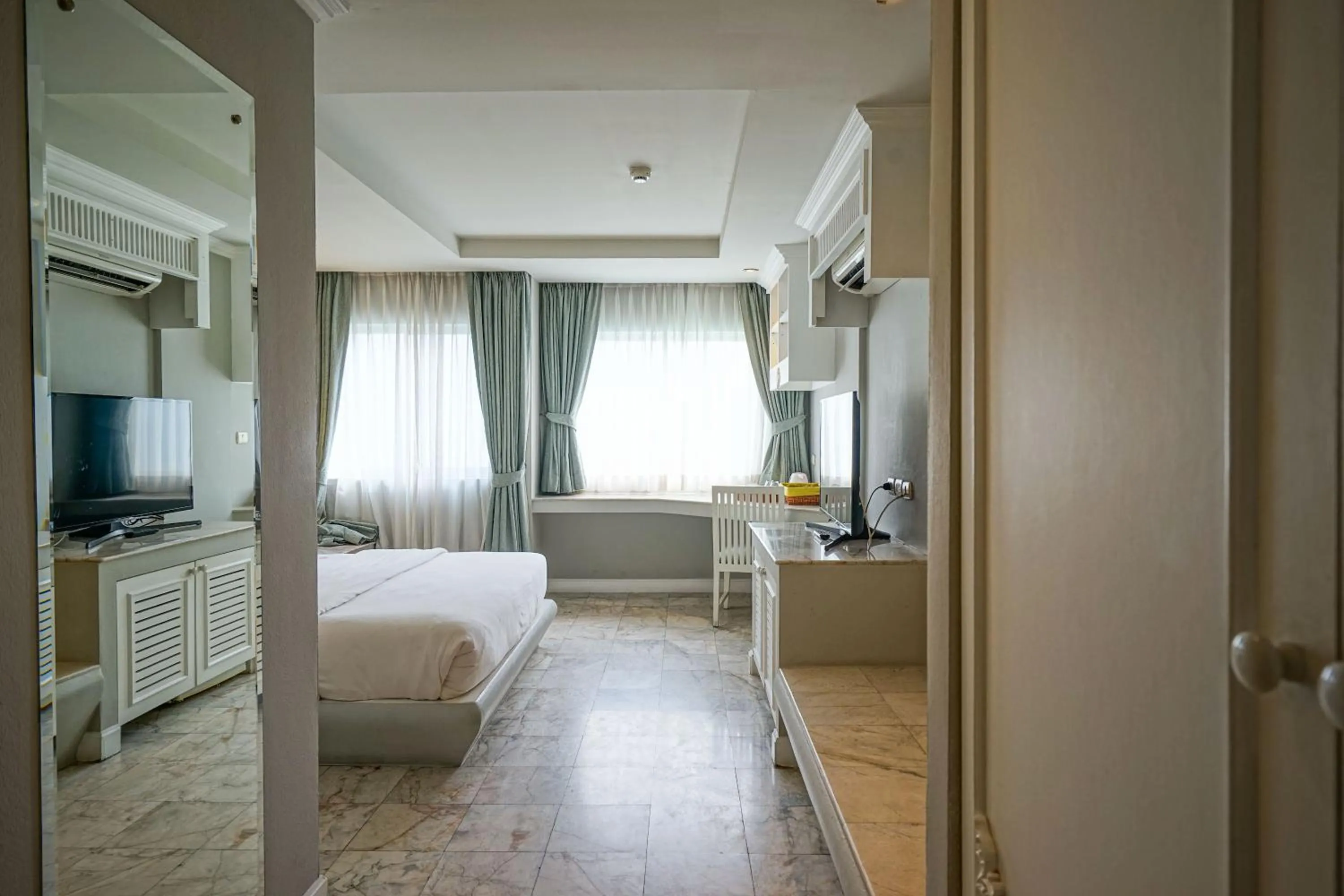 Photo of the whole room, Bed in At Pingnakorn Nimman Hotel