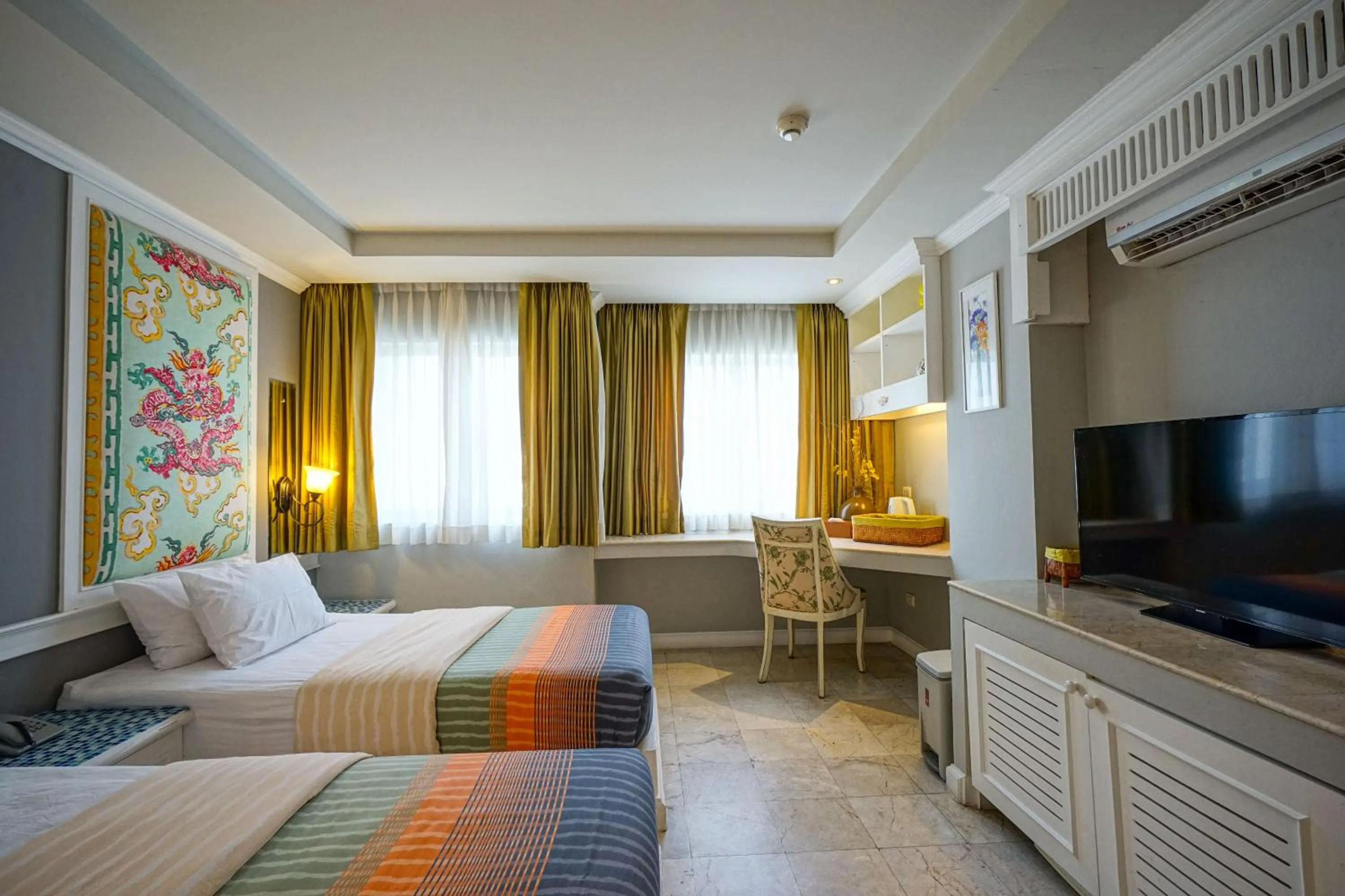 Bed in At Pingnakorn Nimman Hotel