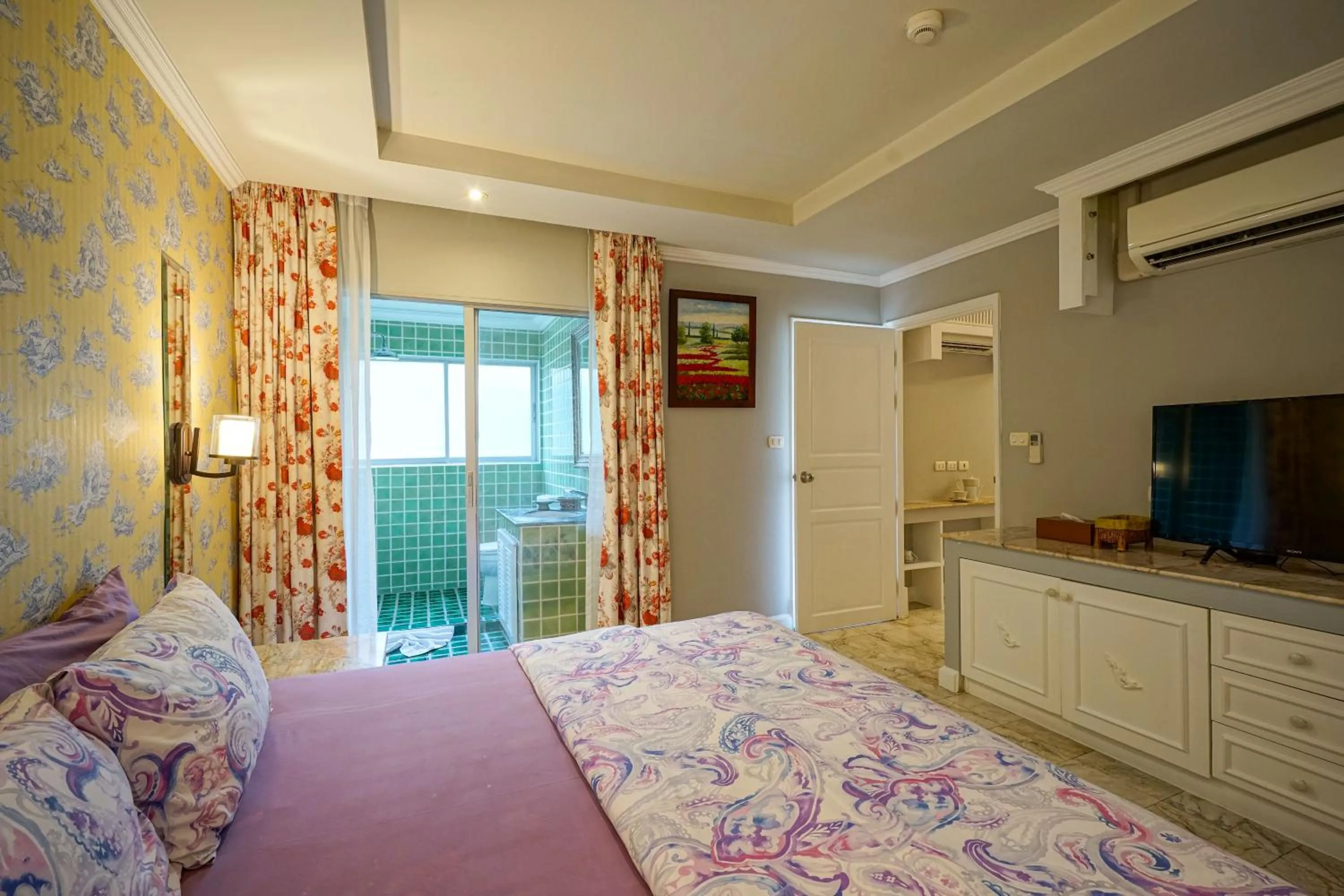 Bed in At Pingnakorn Nimman Hotel