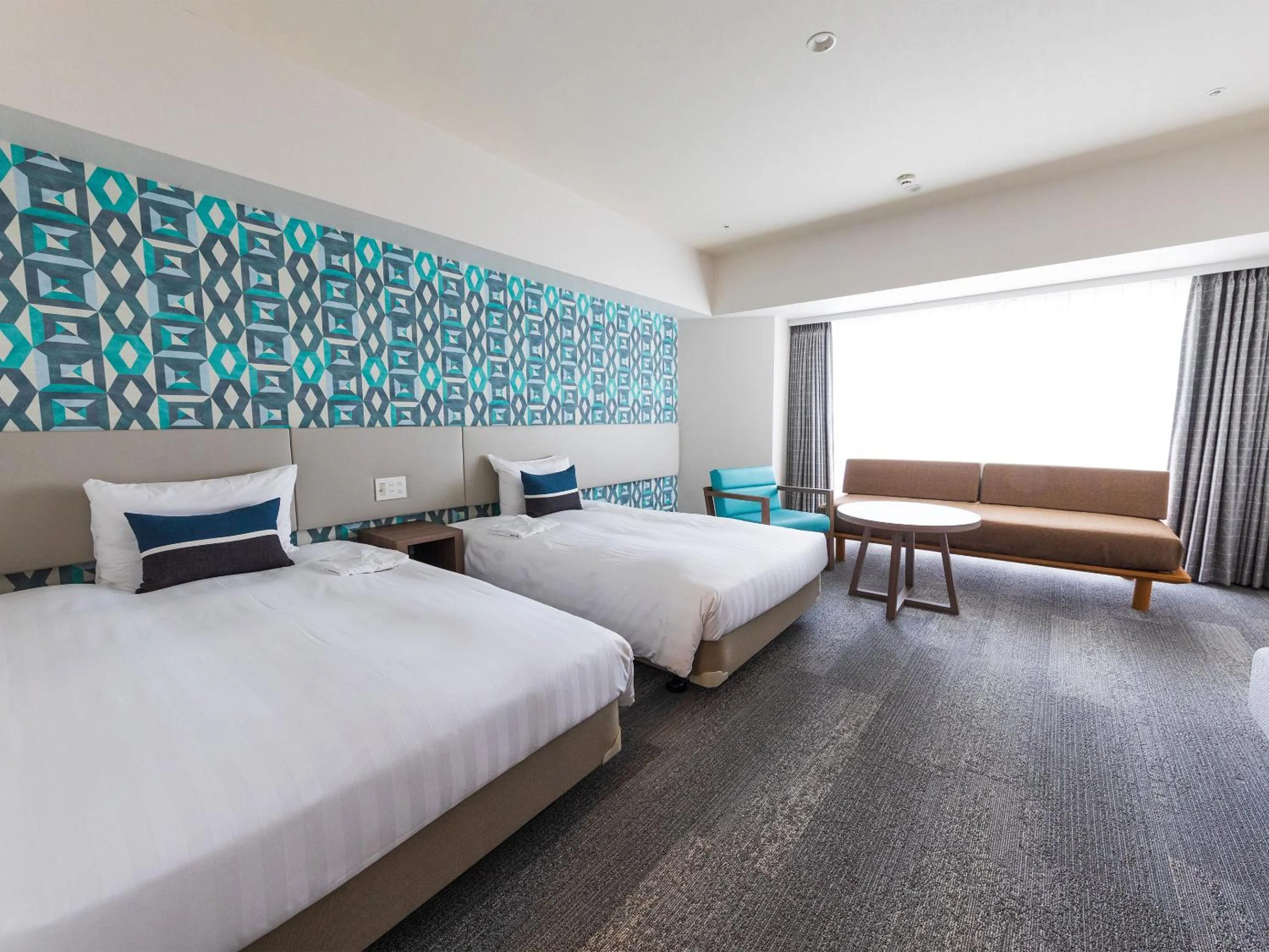 Bed in Okinawa Grand Mer Resort