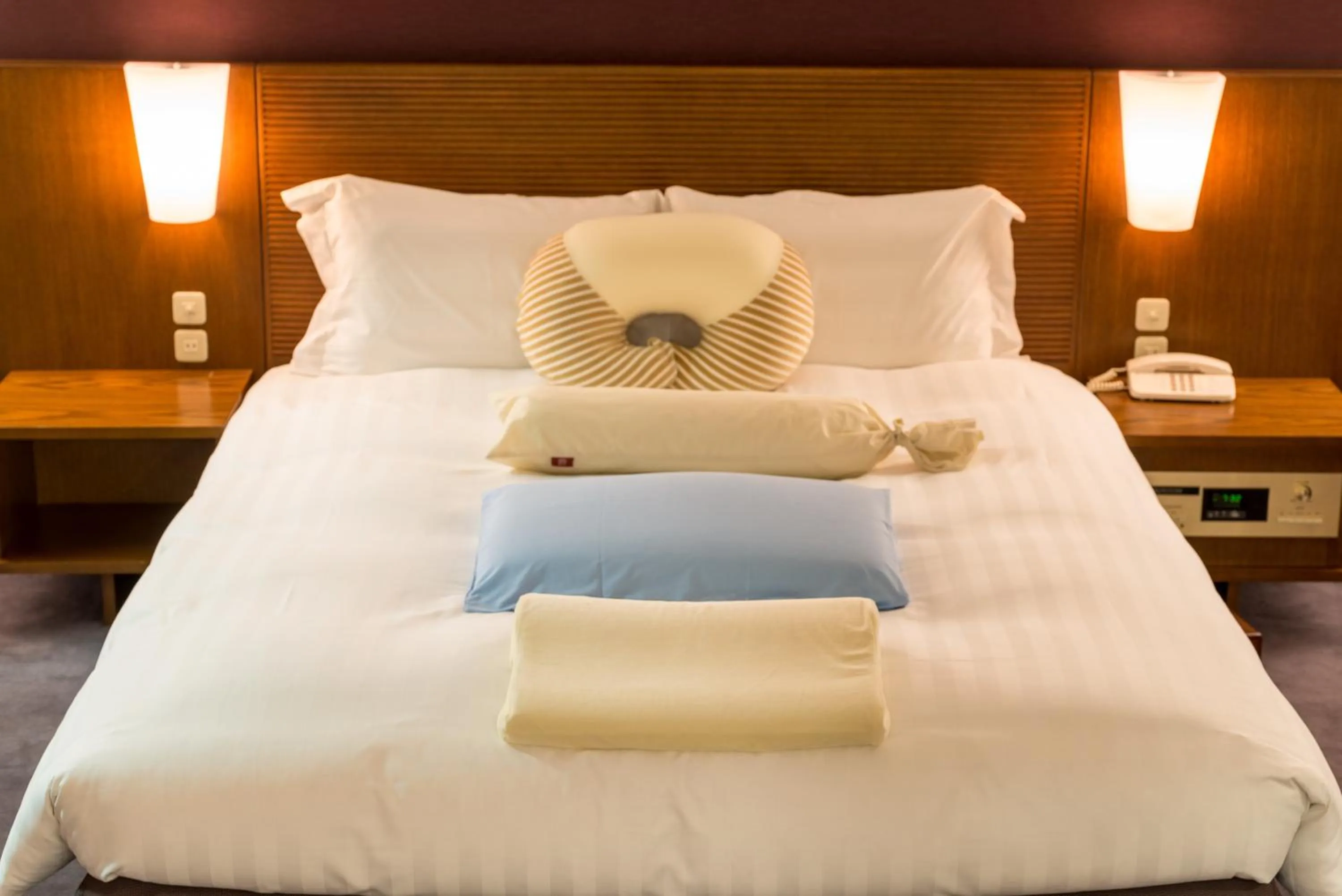 Bed in Okinawa Grand Mer Resort