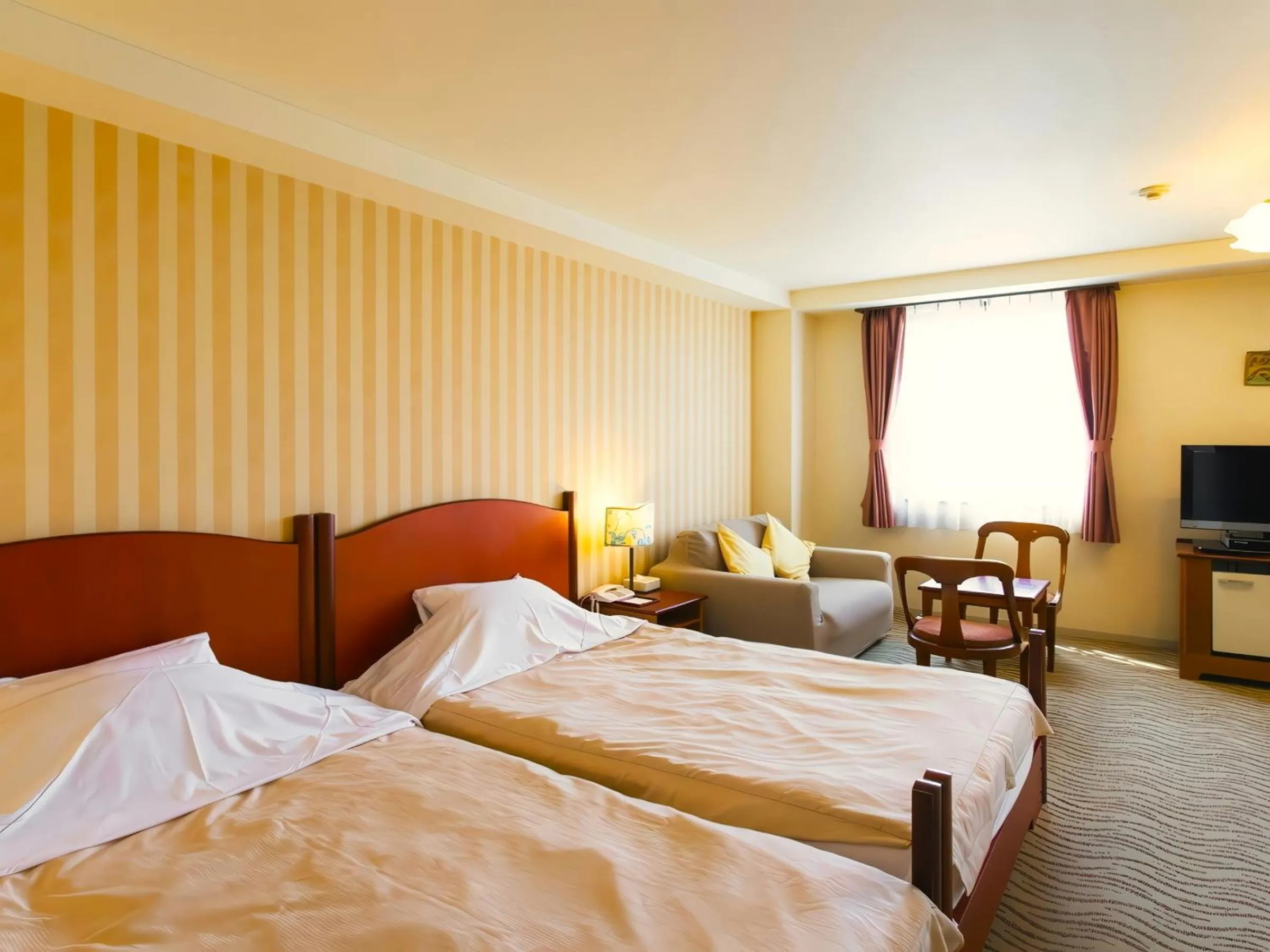 Bed in Kitabiwako Hotel Grazie