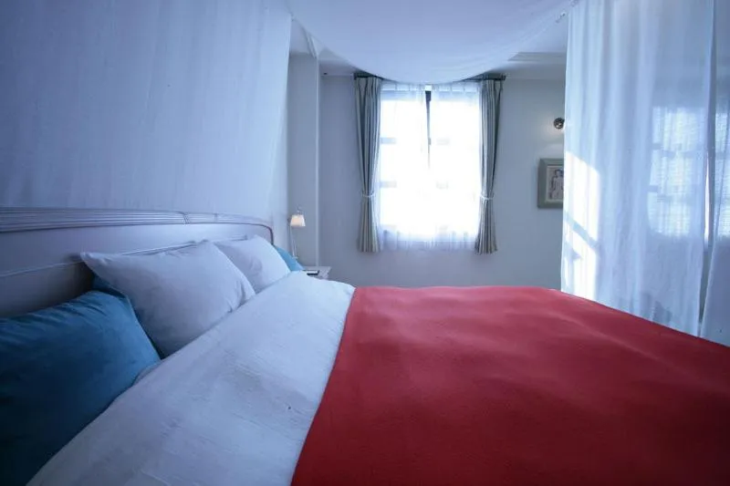 Bed in Kitabiwako Hotel Grazie