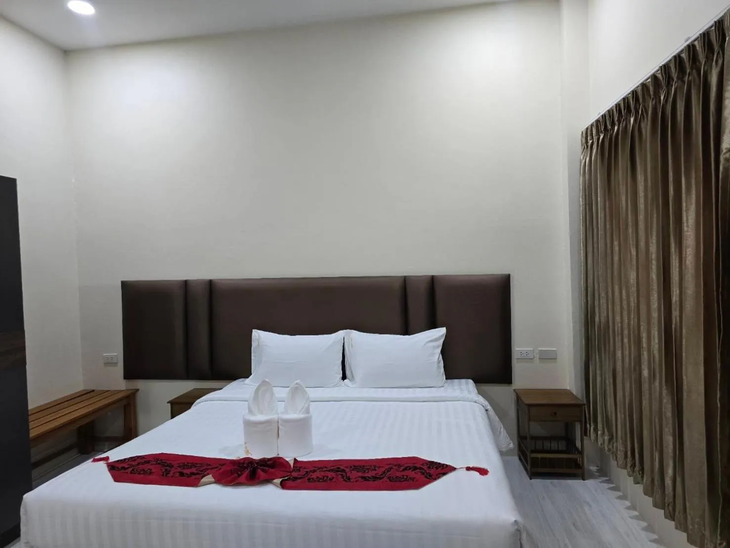 Bed in Natural Samui Hotel