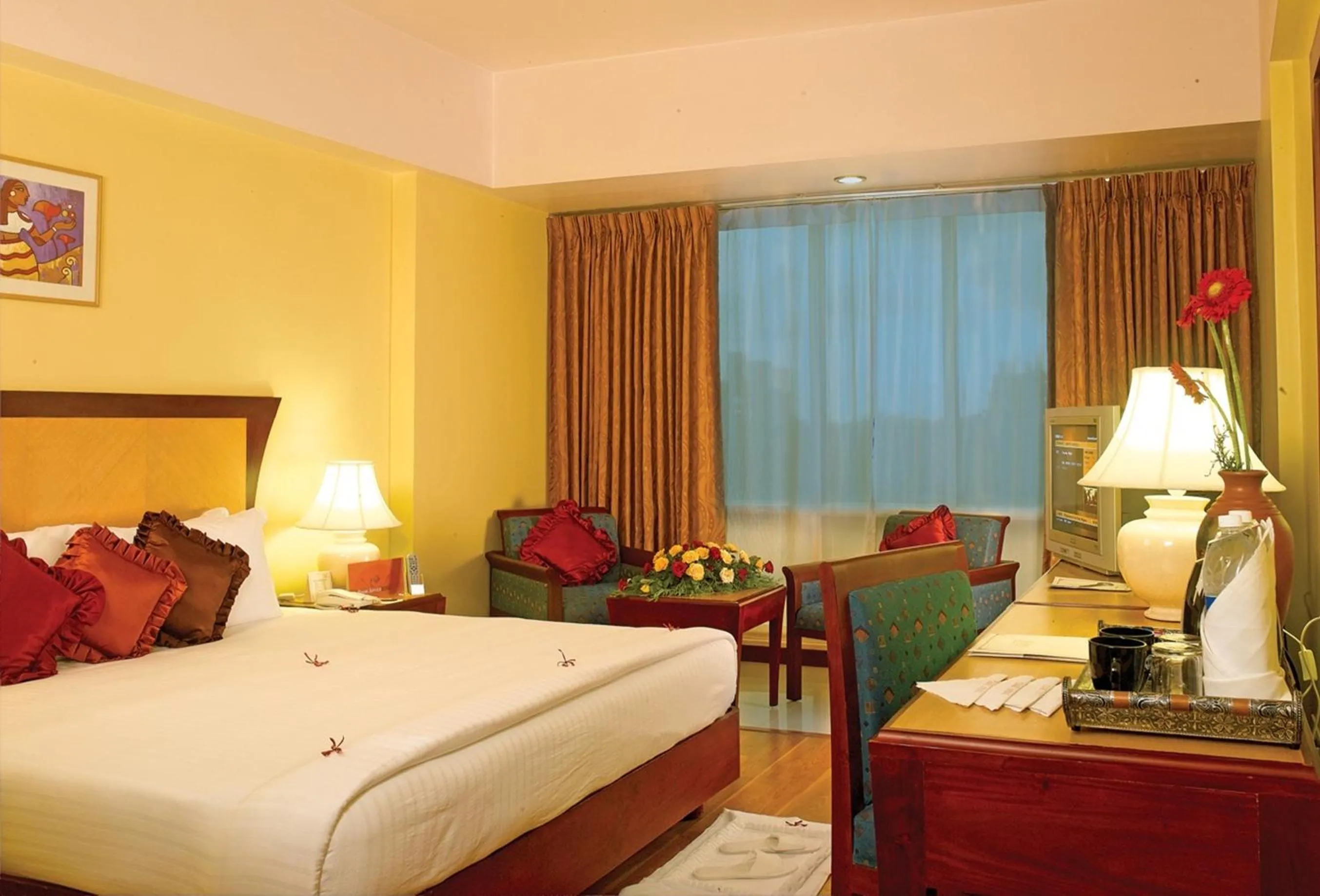 Photo of the whole room, Bed in Classic Sarovar Portico Trivandrum