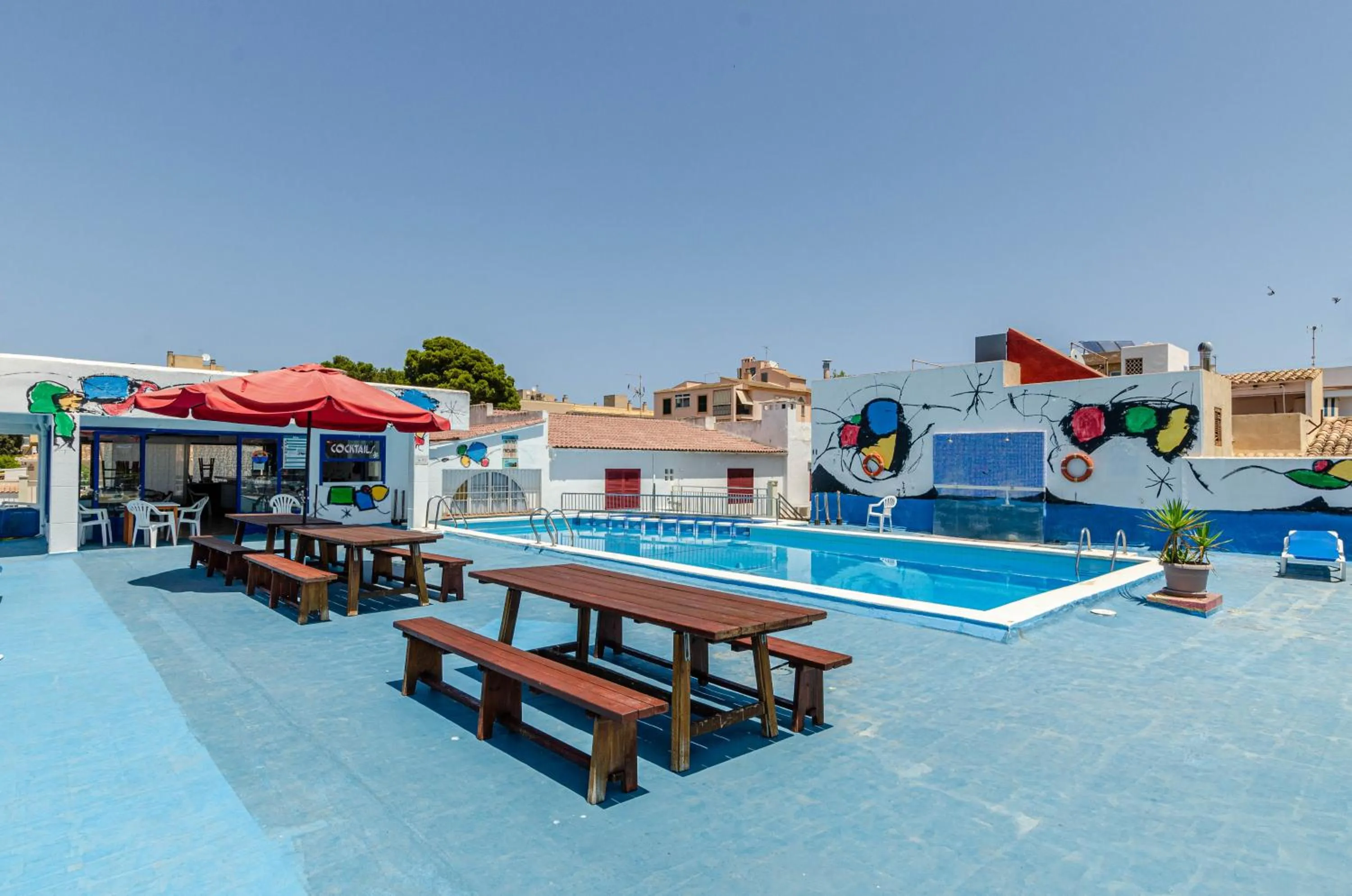 Swimming pool in Hostal Gami Adults Only