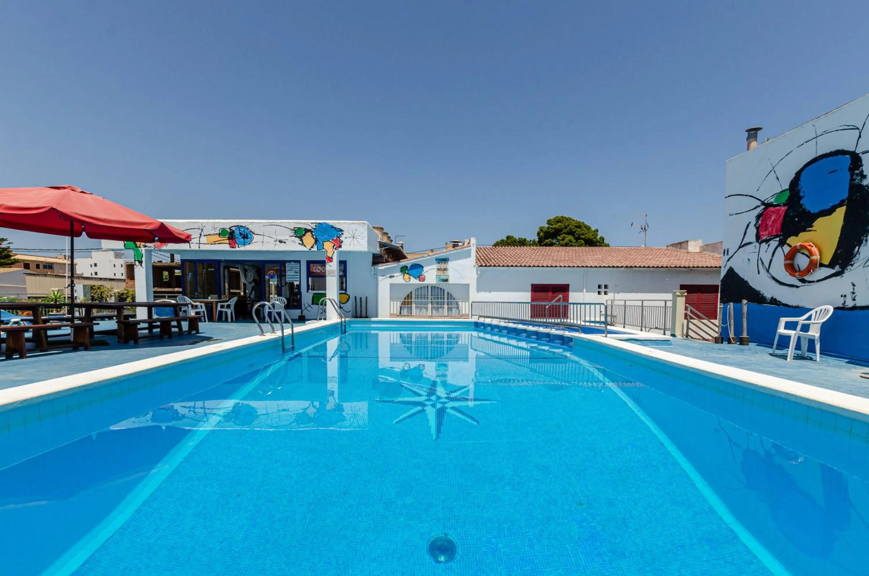 Swimming pool in Hostal Gami Adults Only