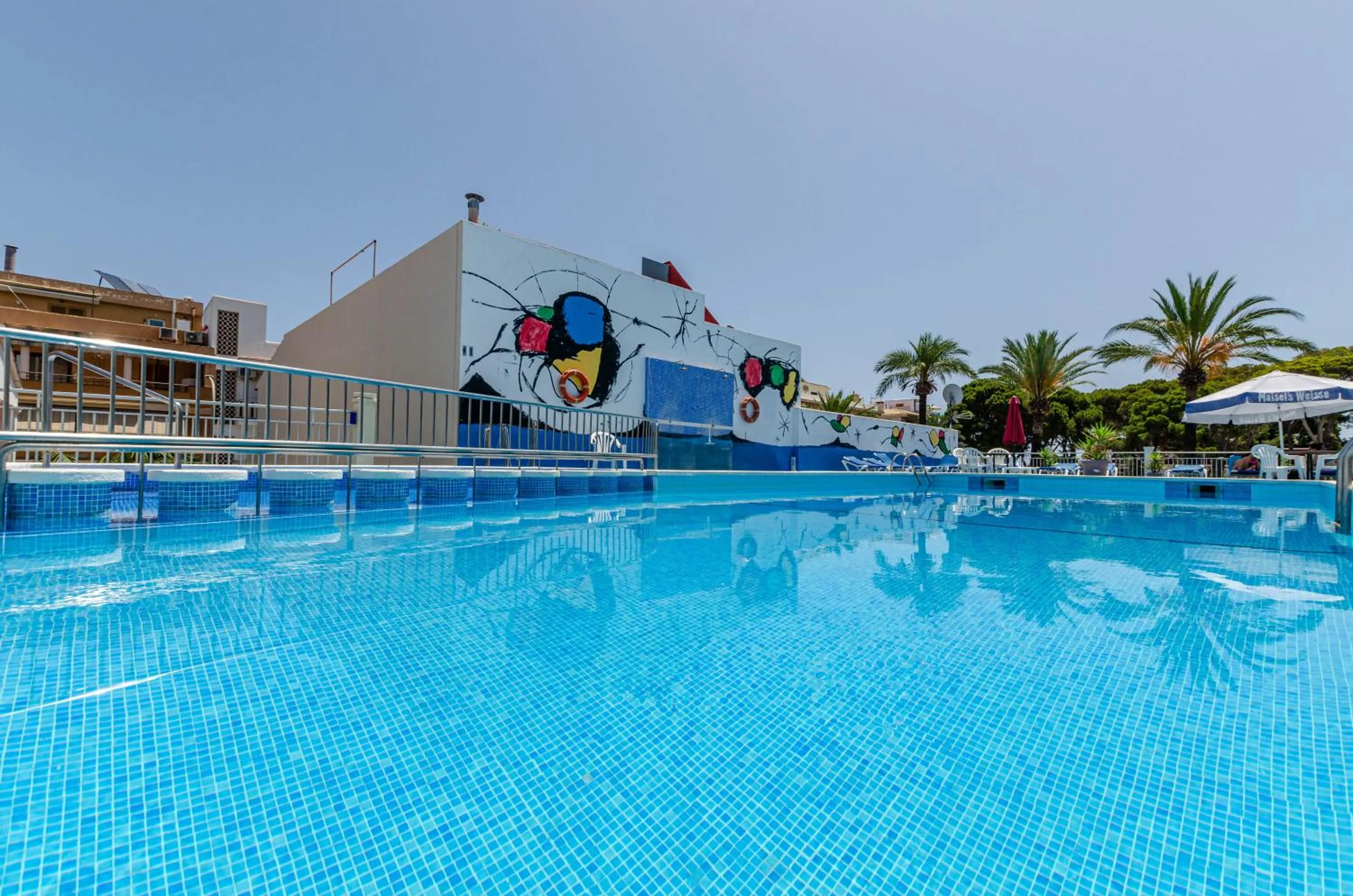 Swimming pool in Hostal Gami Adults Only