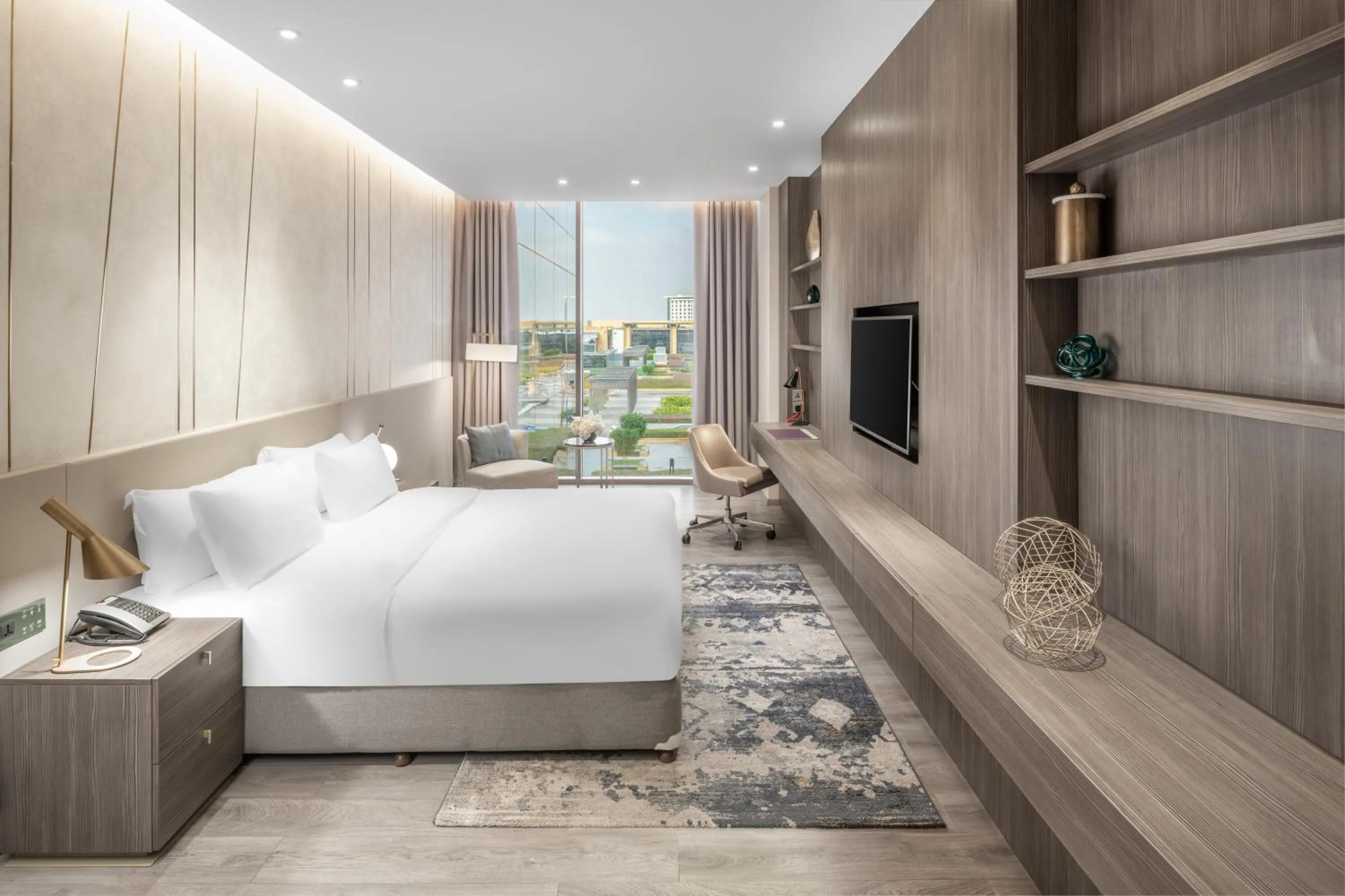 Living room, Bed in Views Hotel & Residences - Emaar King Abdullah Economic City