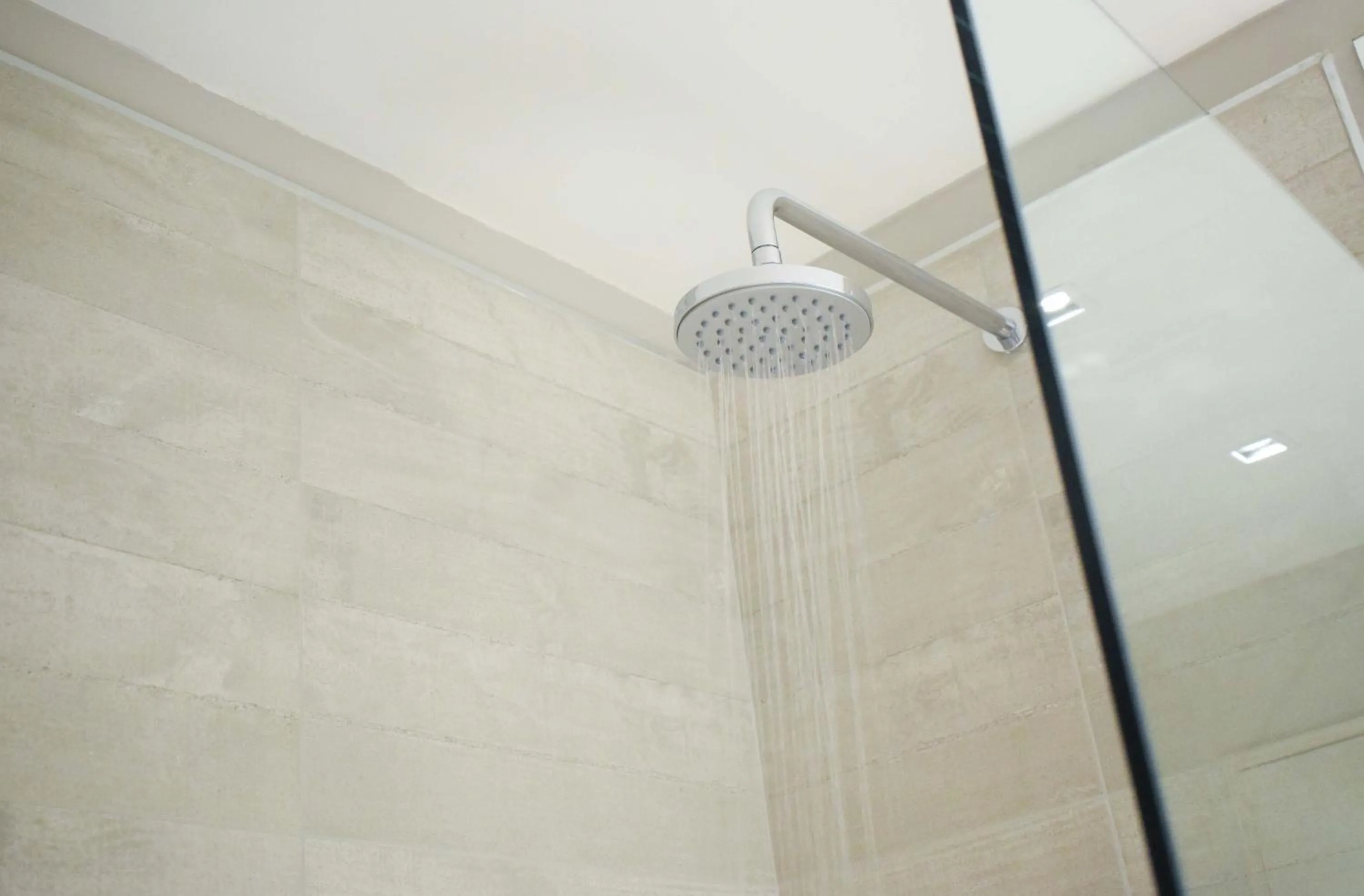 Shower in Cyan Soho Neuquén Hotel