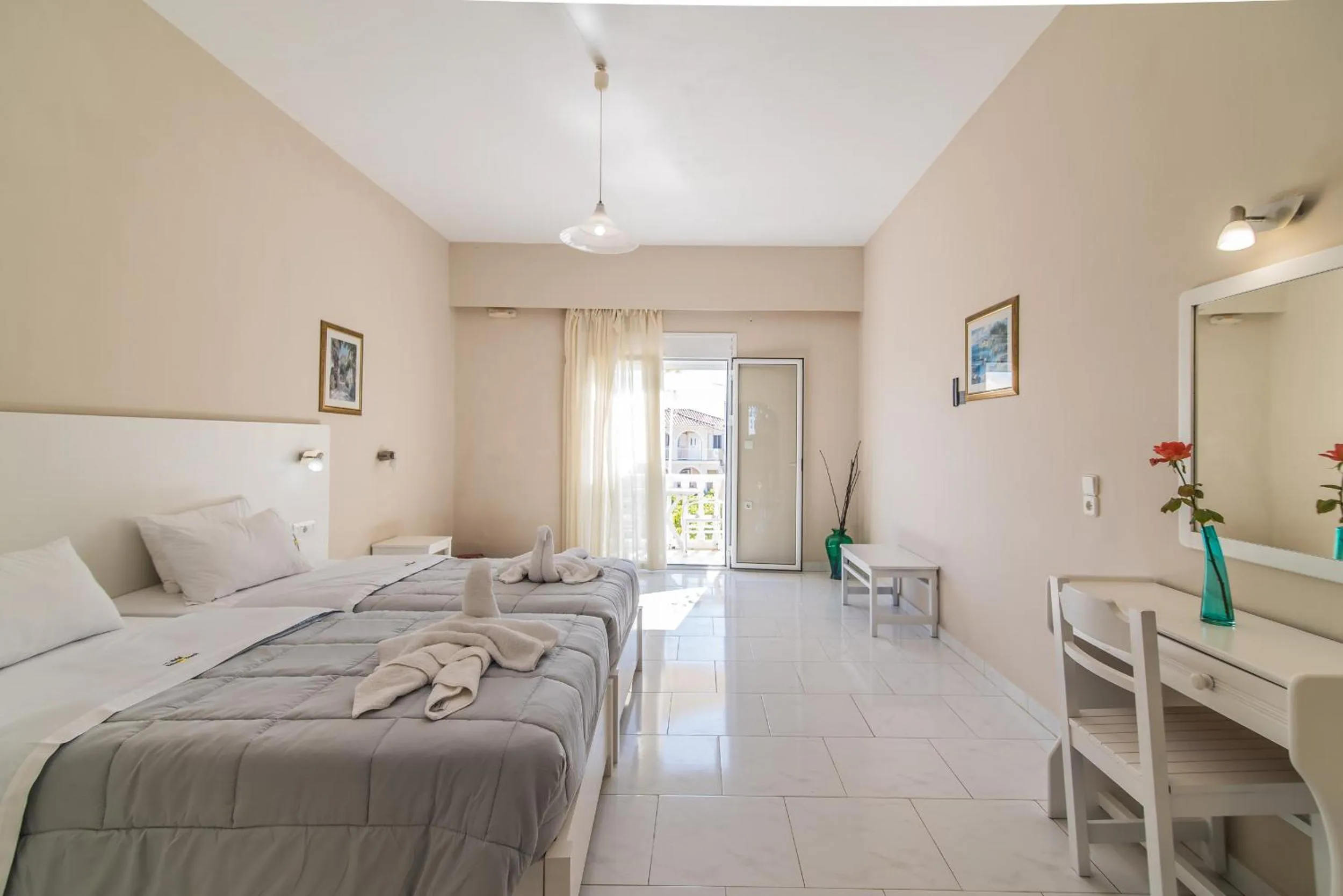 Bedroom in Belussi Beach Hotel & Suites