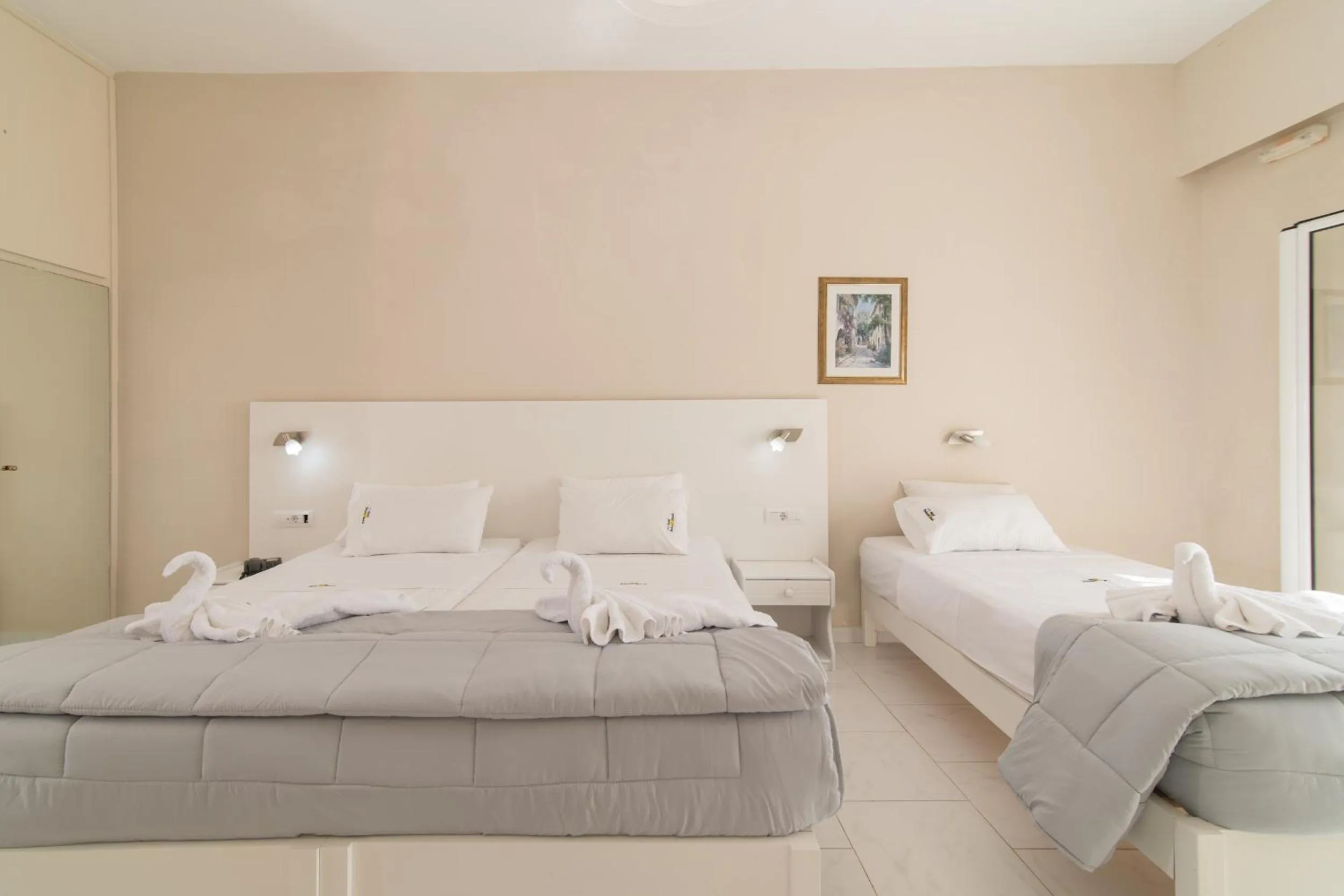 Bedroom in Belussi Beach Hotel & Suites