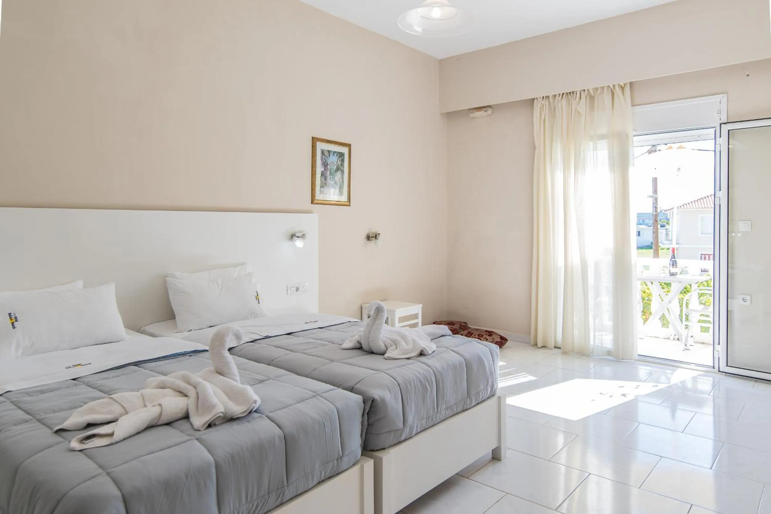 Bedroom in Belussi Beach Hotel & Suites