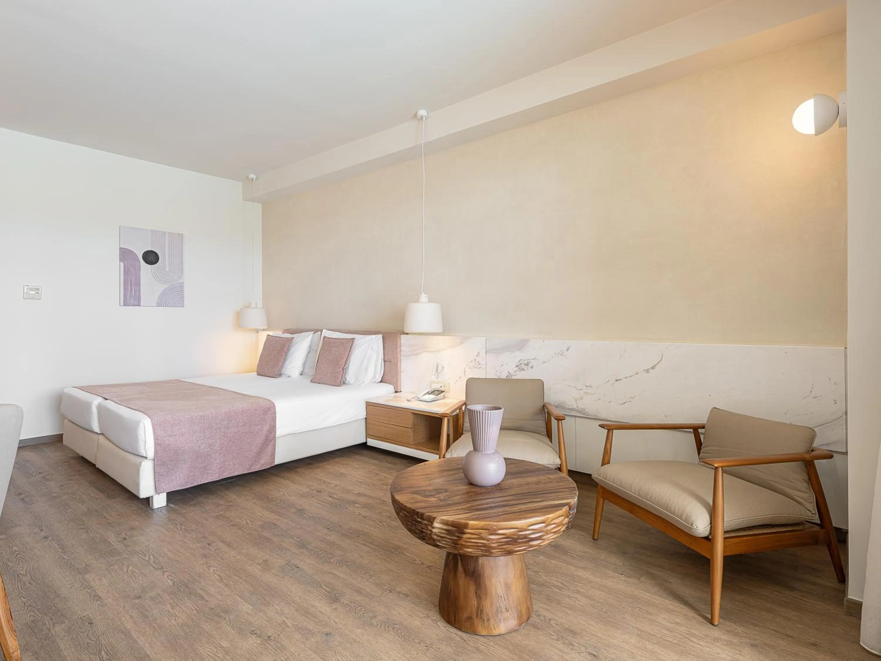 Bed in Avra Imperial Hotel