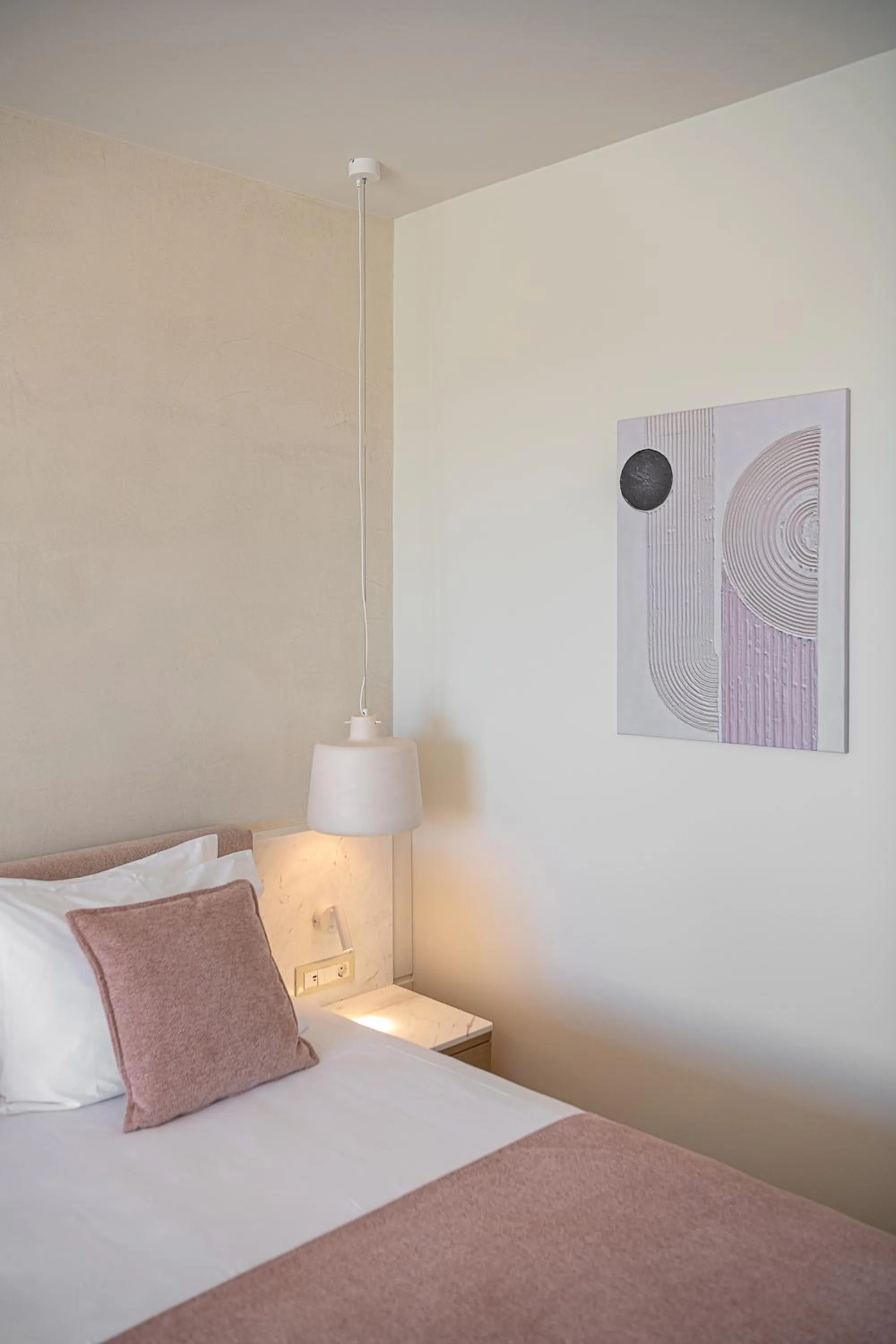 Bed in Avra Imperial Hotel