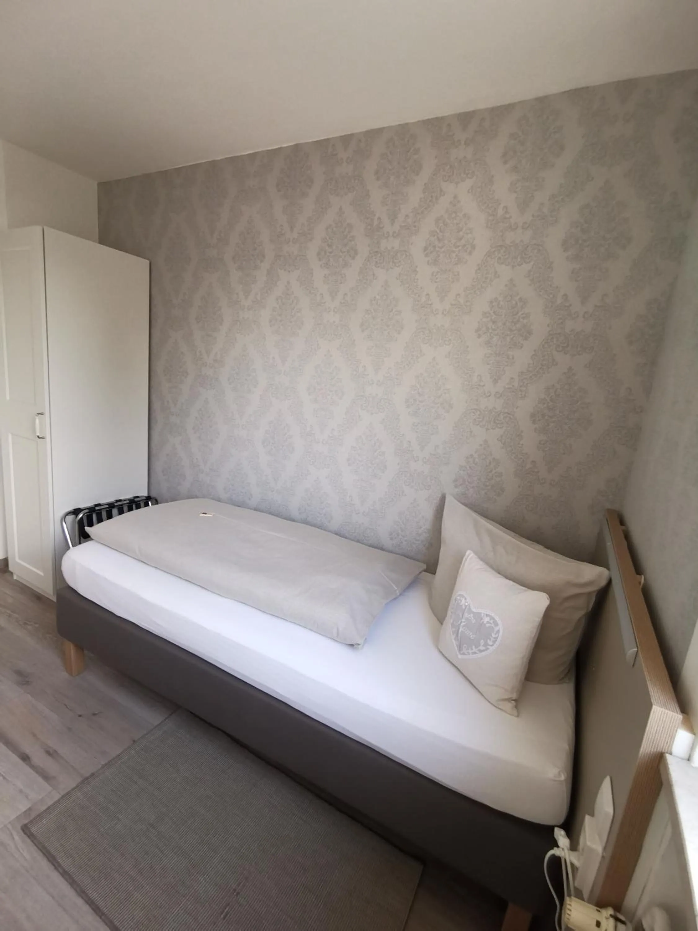 Decorative detail, Bed in City Hotel Franziska