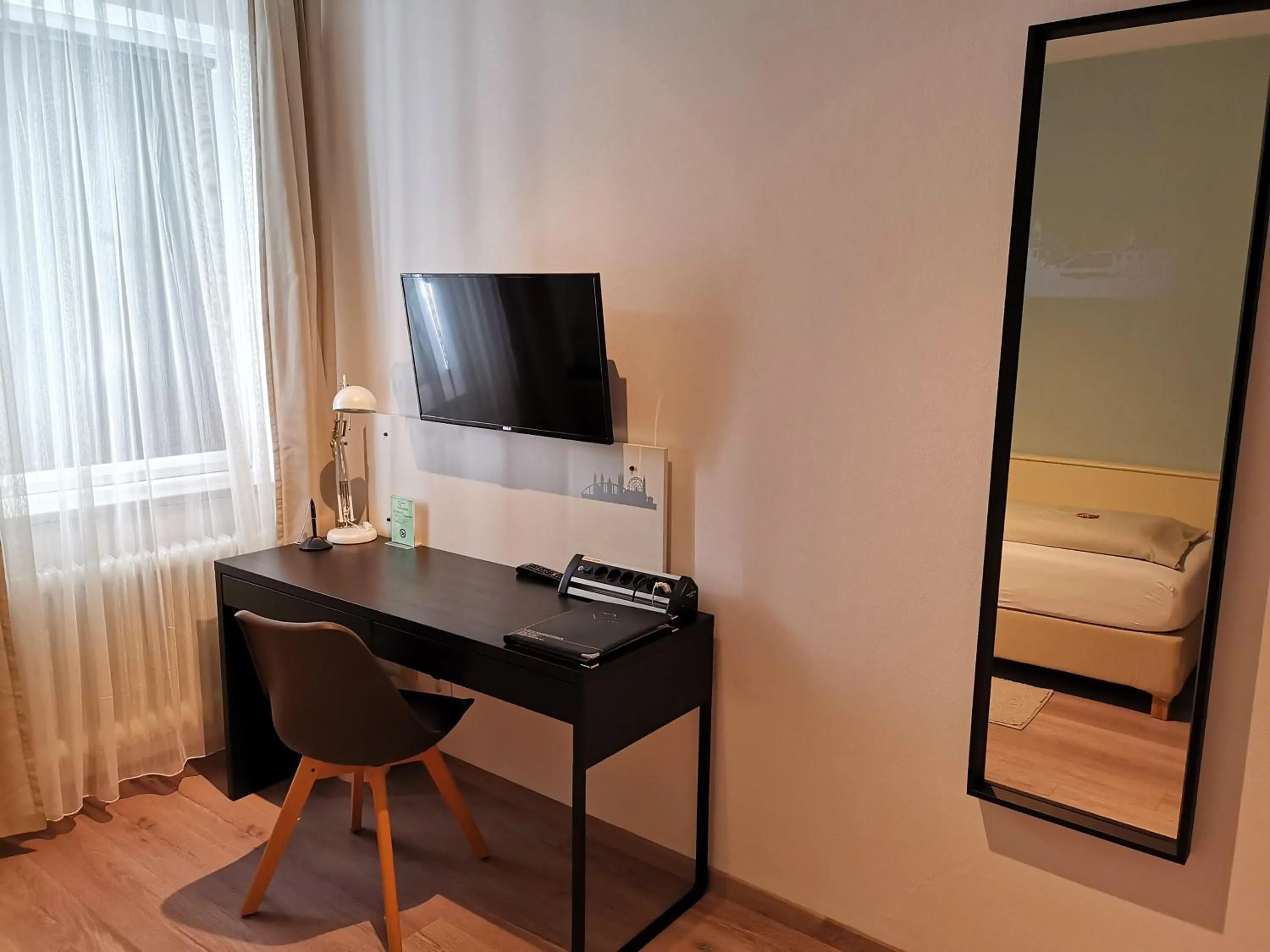 TV and multimedia, Bed in City Hotel Franziska