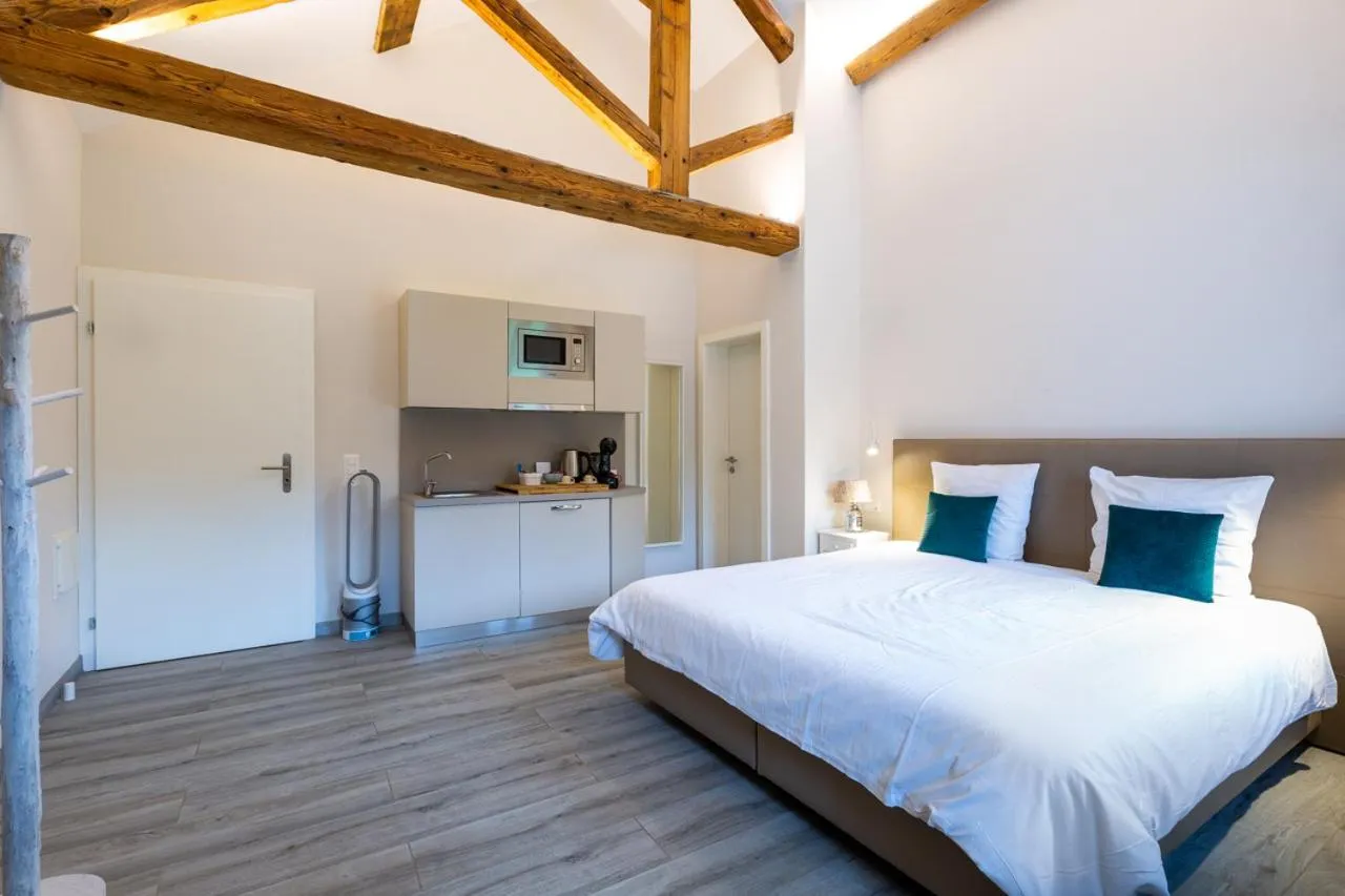 Bed in Auberge des Grands Bois