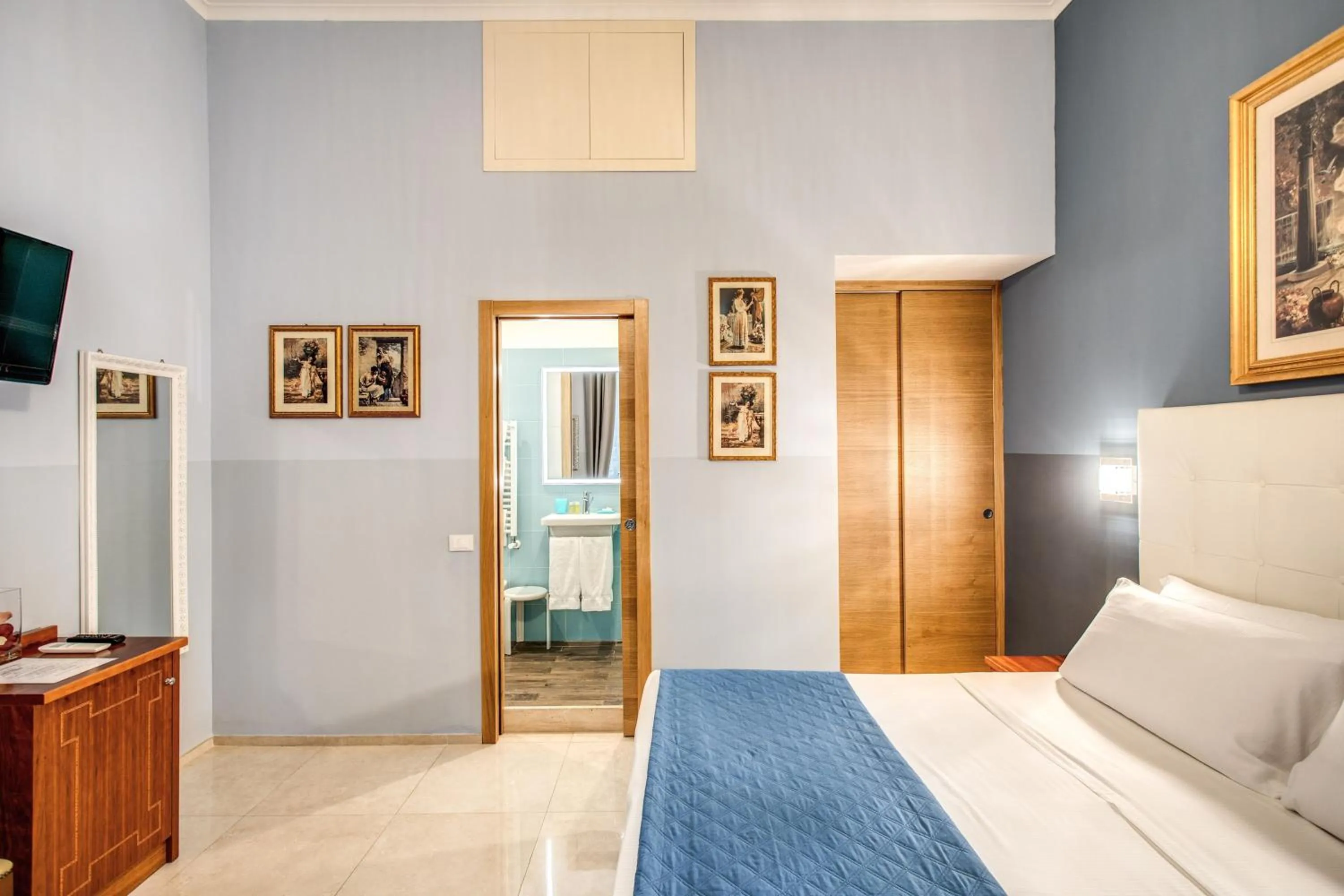 Bed in La Residenza Suites