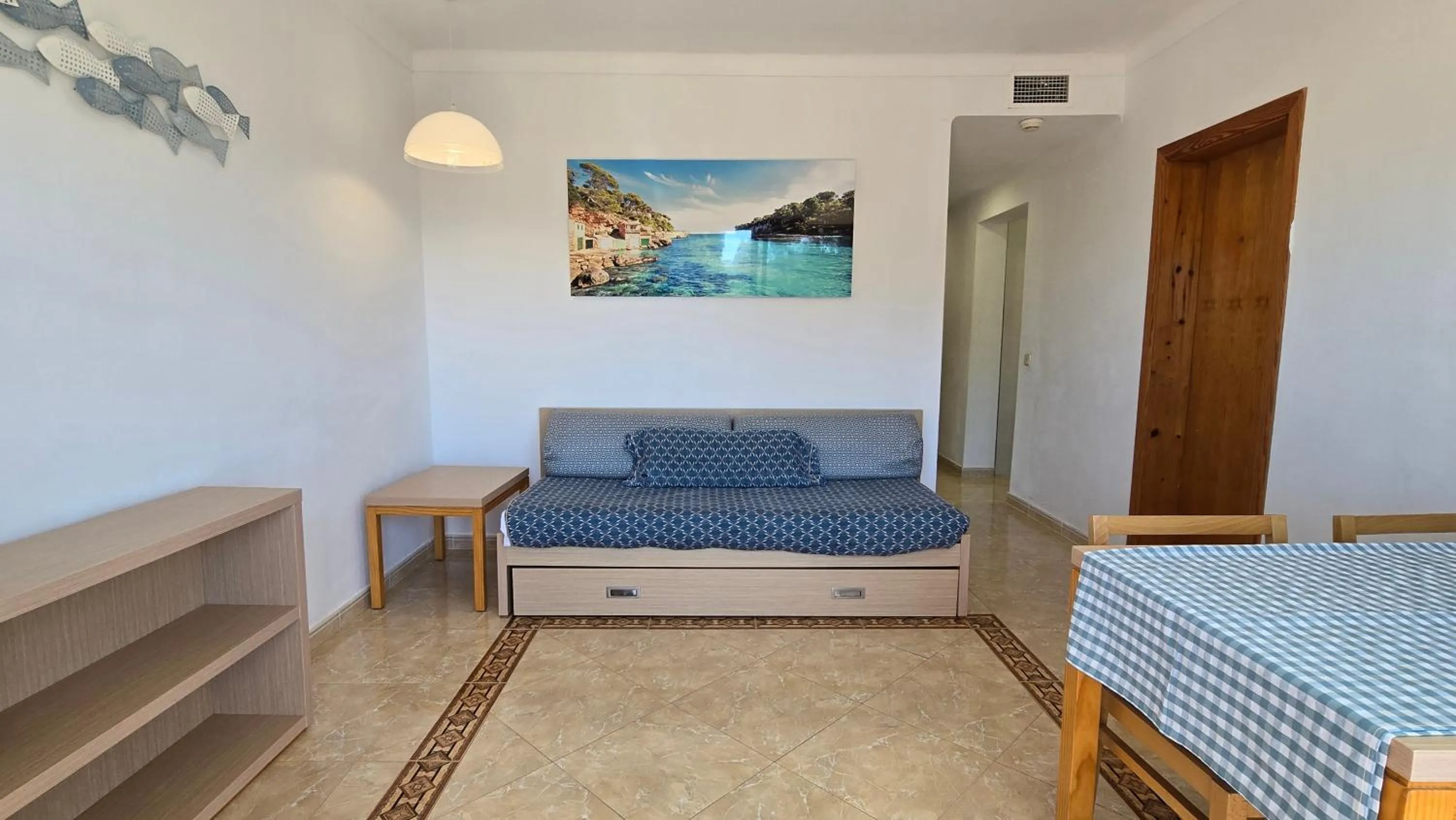 Living room, Bed in Marina Palmanova Apartamentos