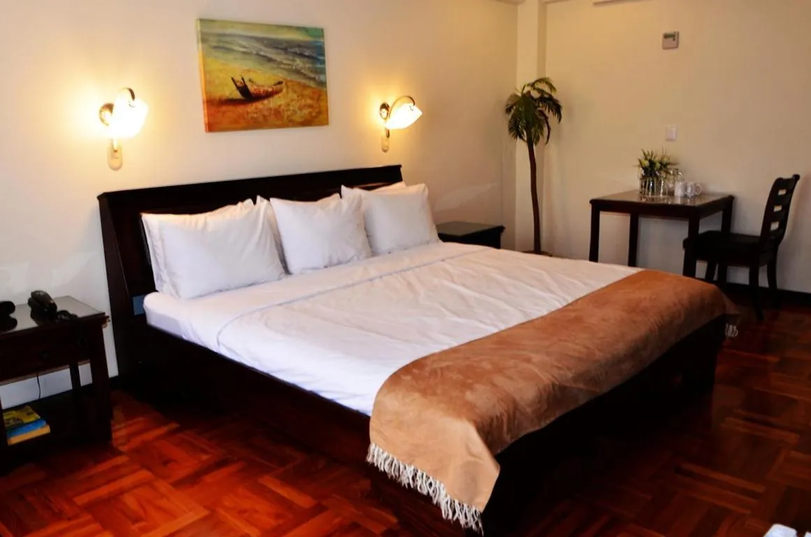 Bed in Hotel Plaza Real Suites & Apartments San Jose