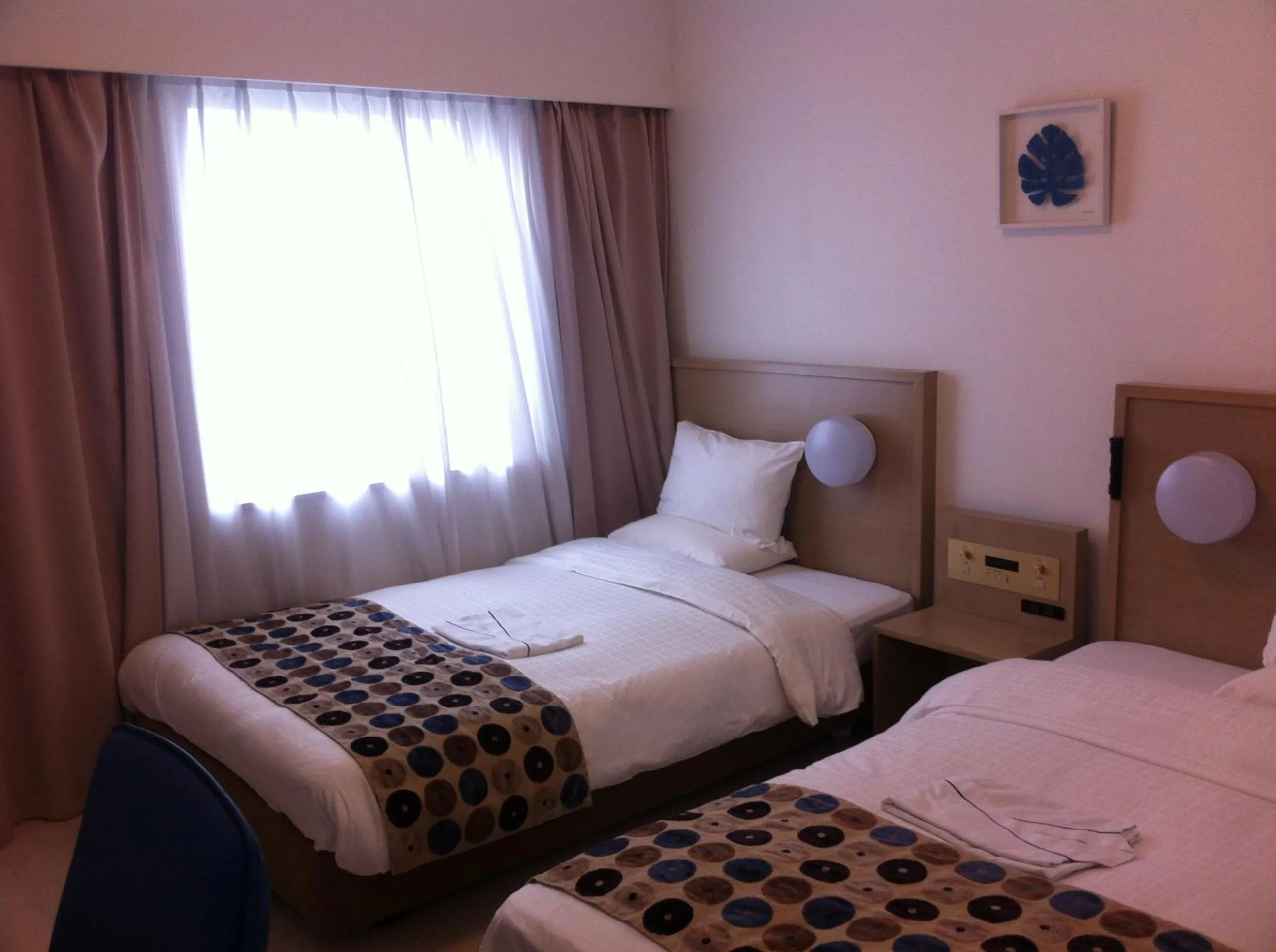 Bed in Smile Hotel Okinawa Naha (Tomari Port)