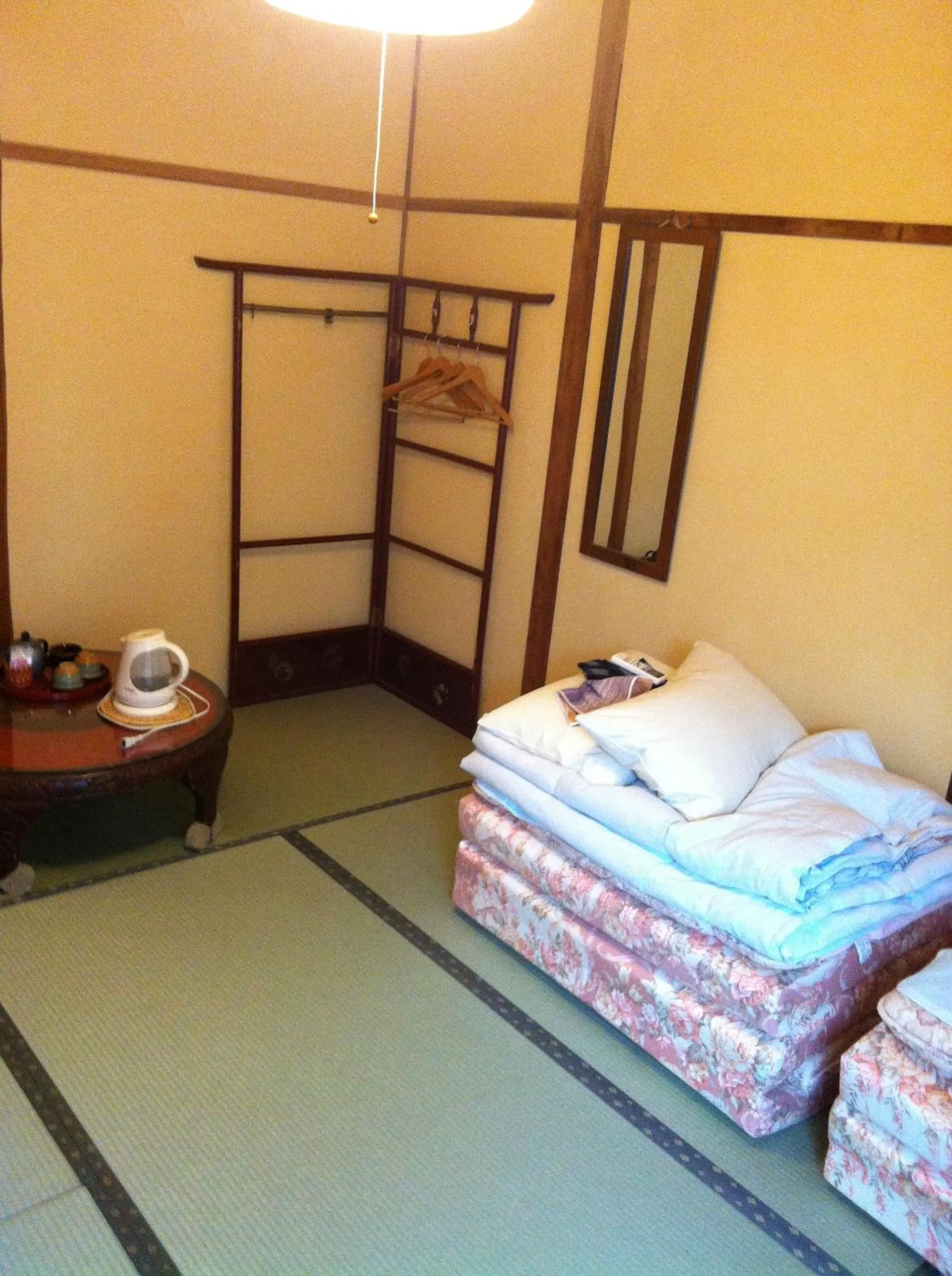 Decorative detail, Bed in Rakucho Ryokan
