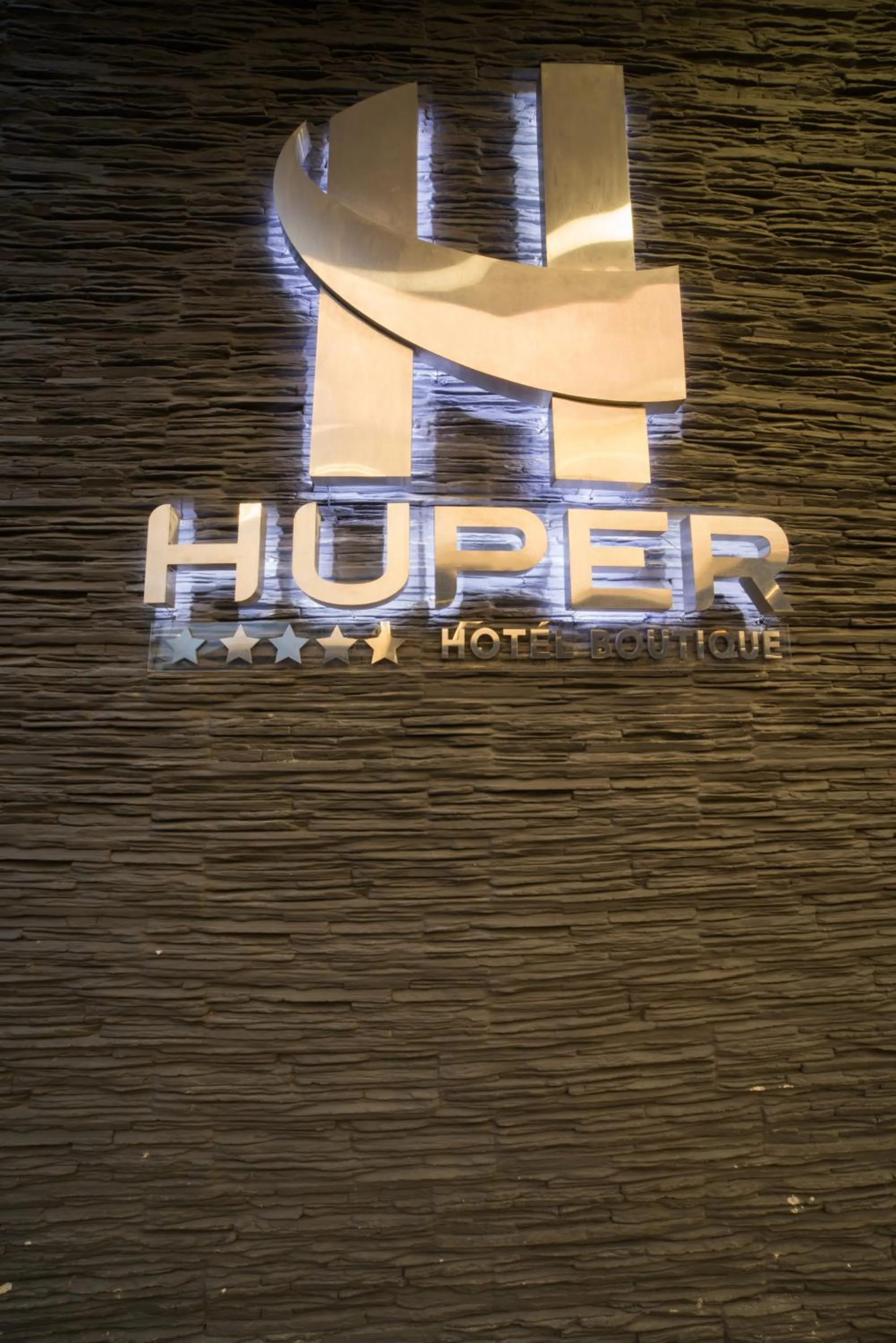 Property logo or sign in Huper Hotel Boutique