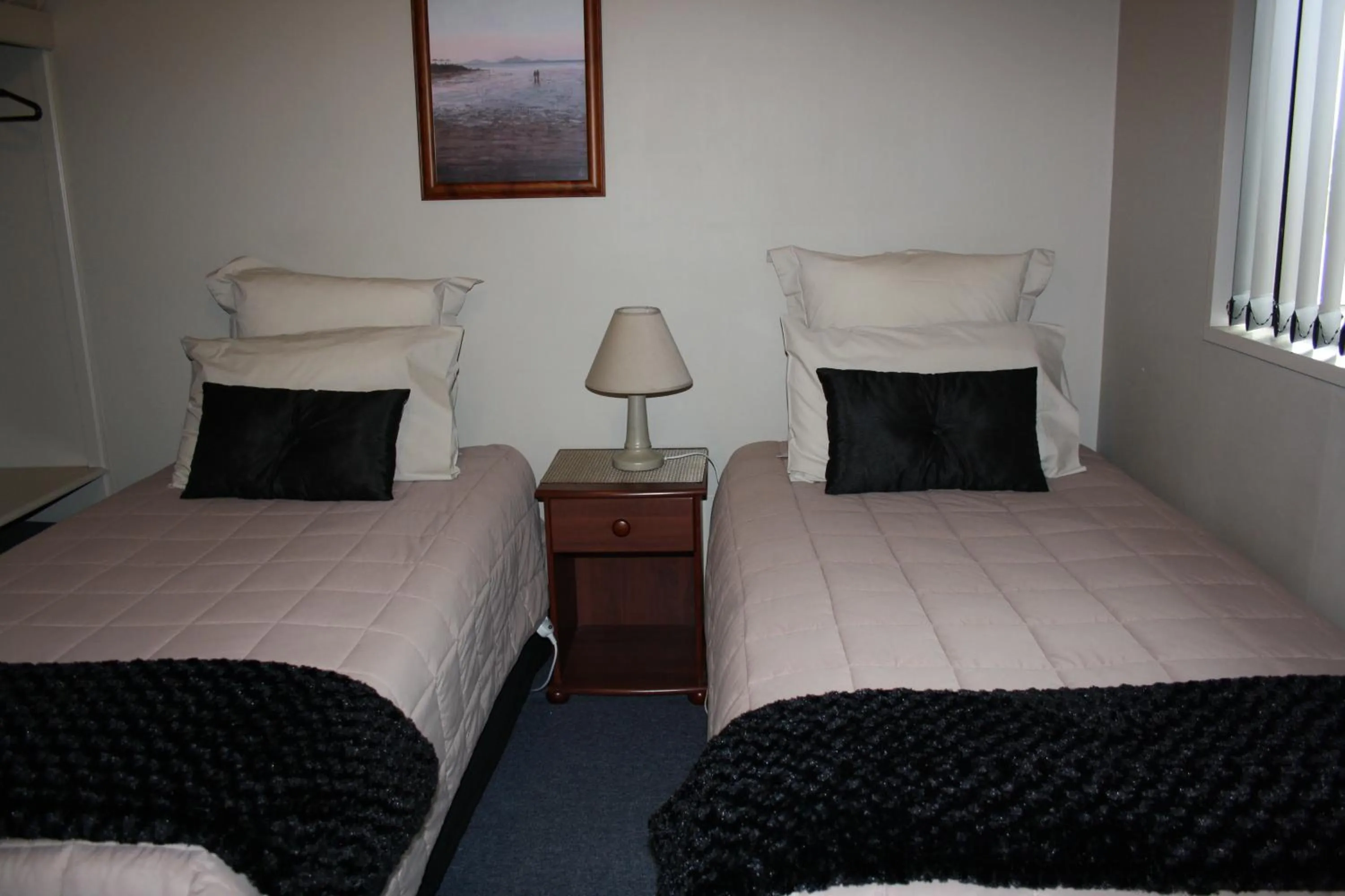 Bed in Ashbury Park Motel