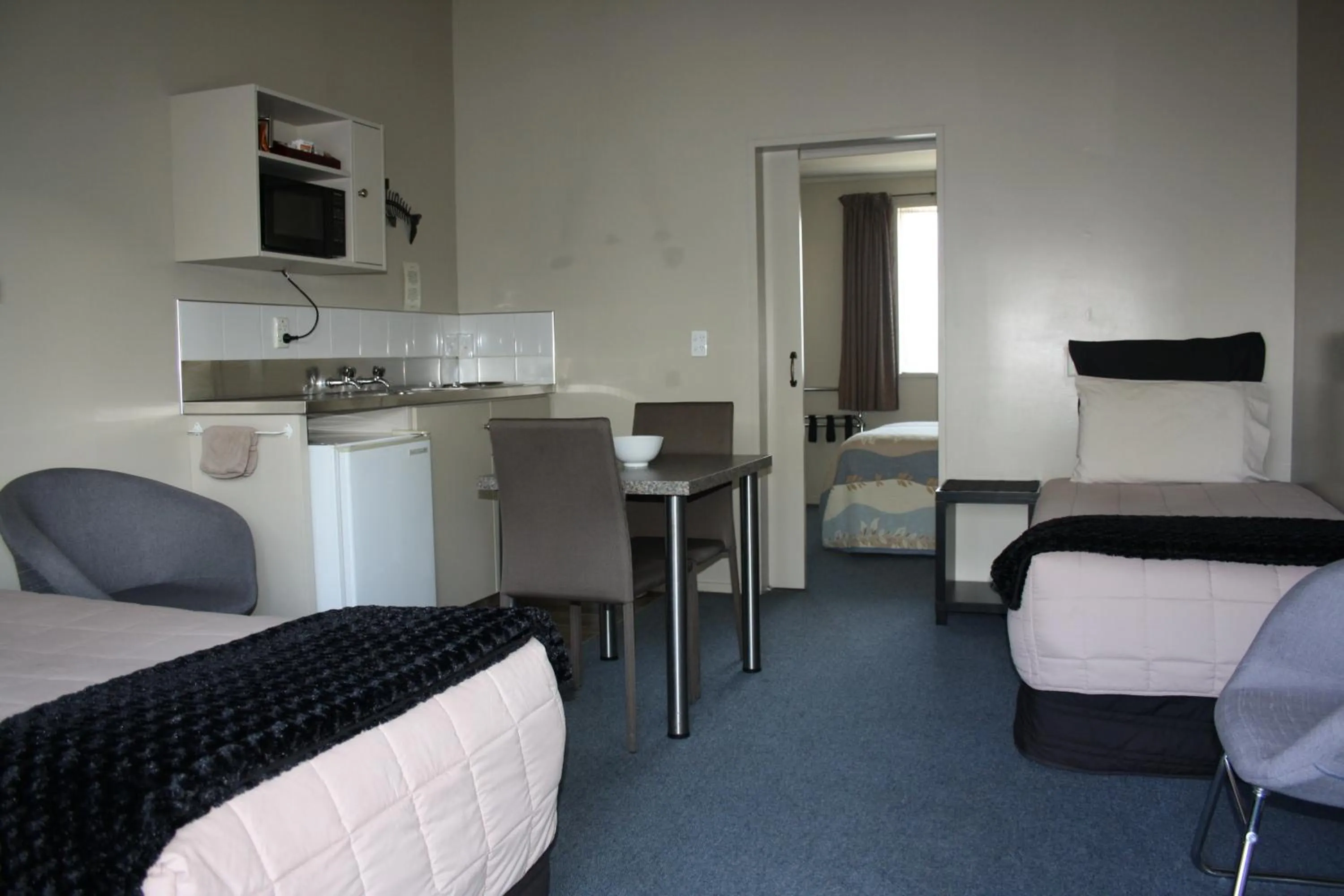 Bed in Ashbury Park Motel