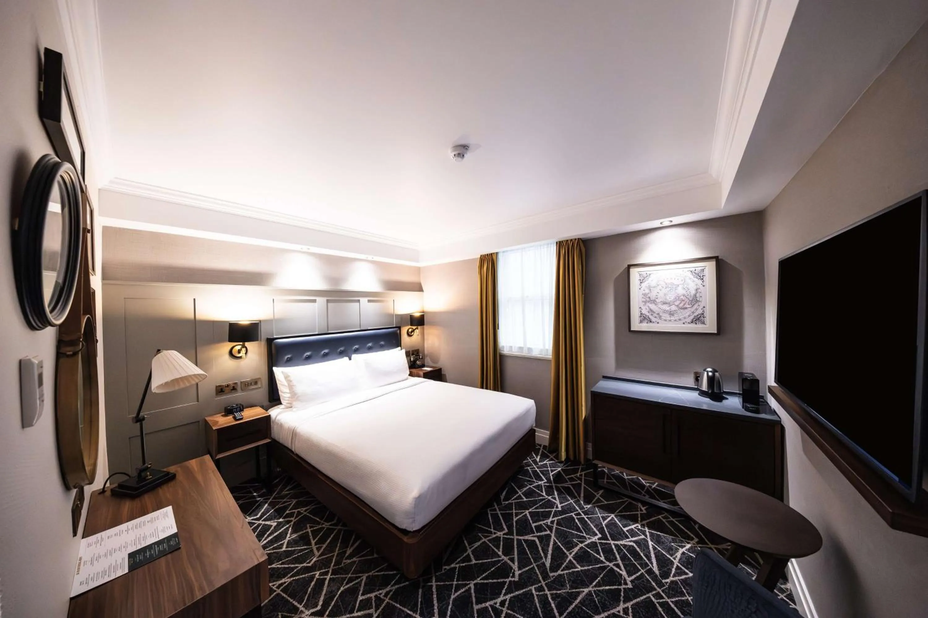 Bed in 100 Queen's Gate Hotel London Kensington, Curio Collection by Hilton