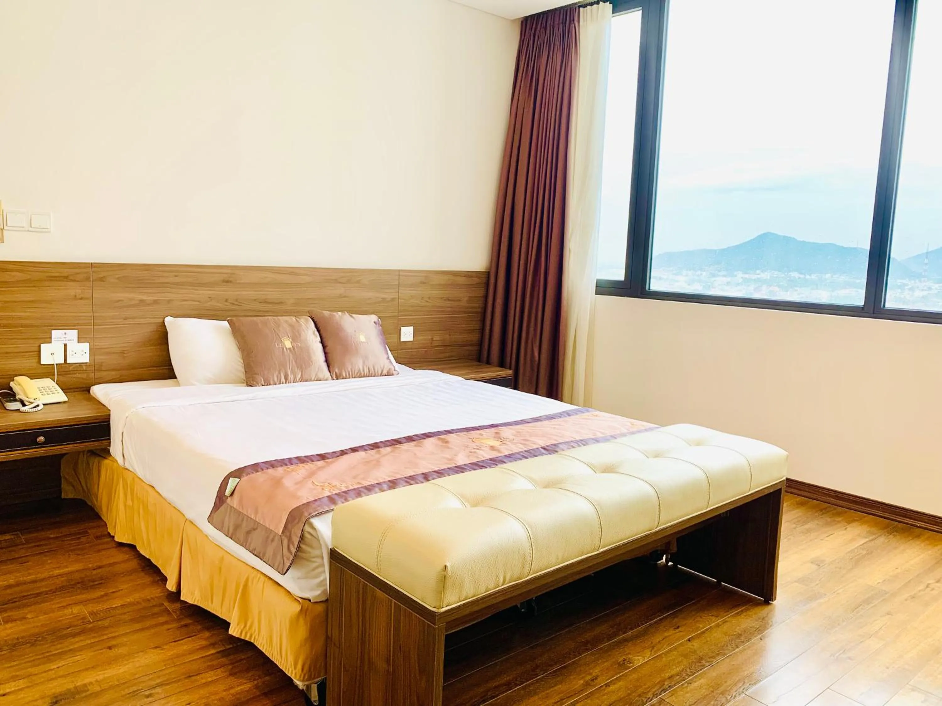 Bed in Lenid Ocean View Hotel