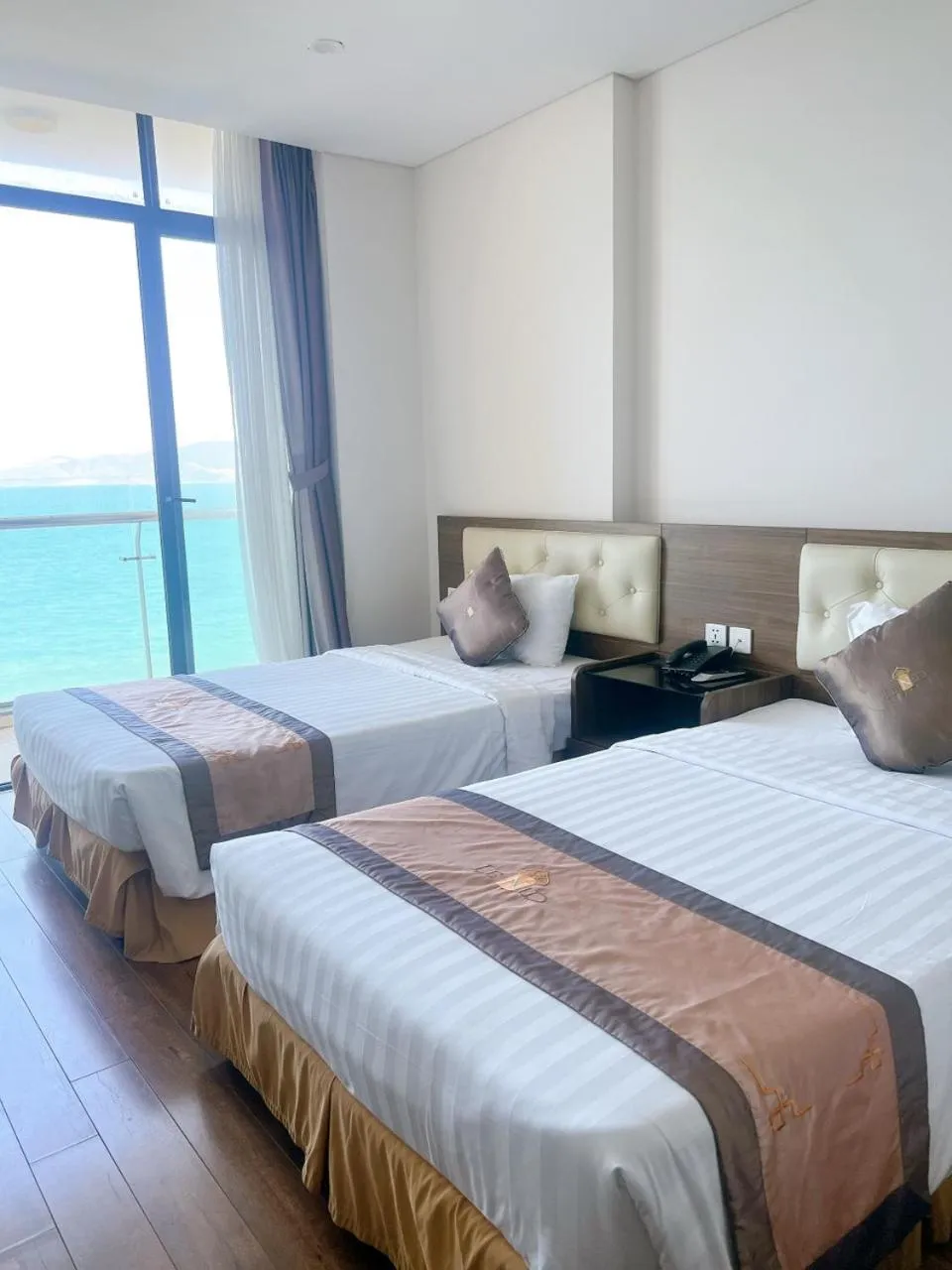 Bed in Lenid Ocean View Hotel