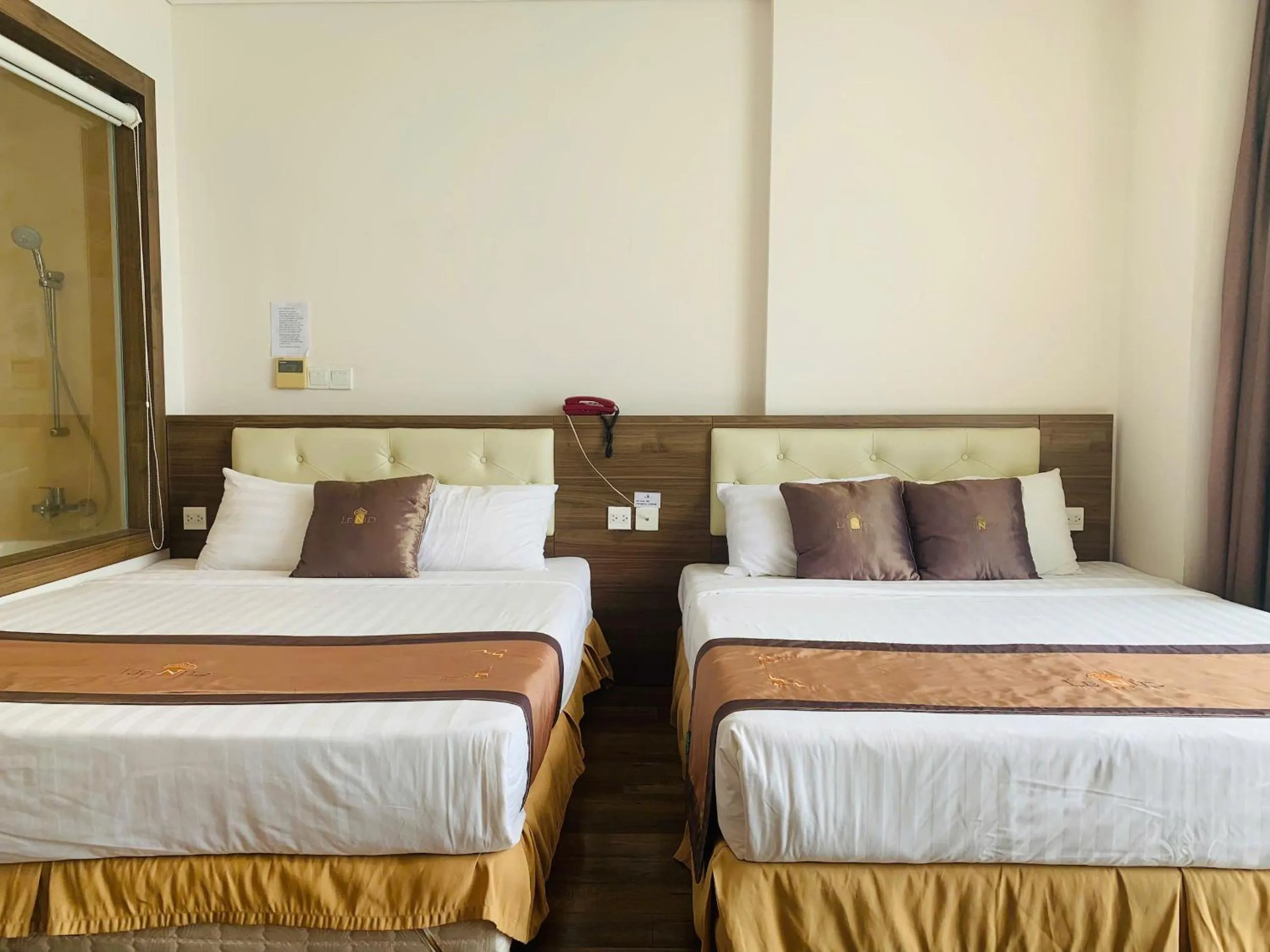 Bed in Lenid Ocean View Hotel