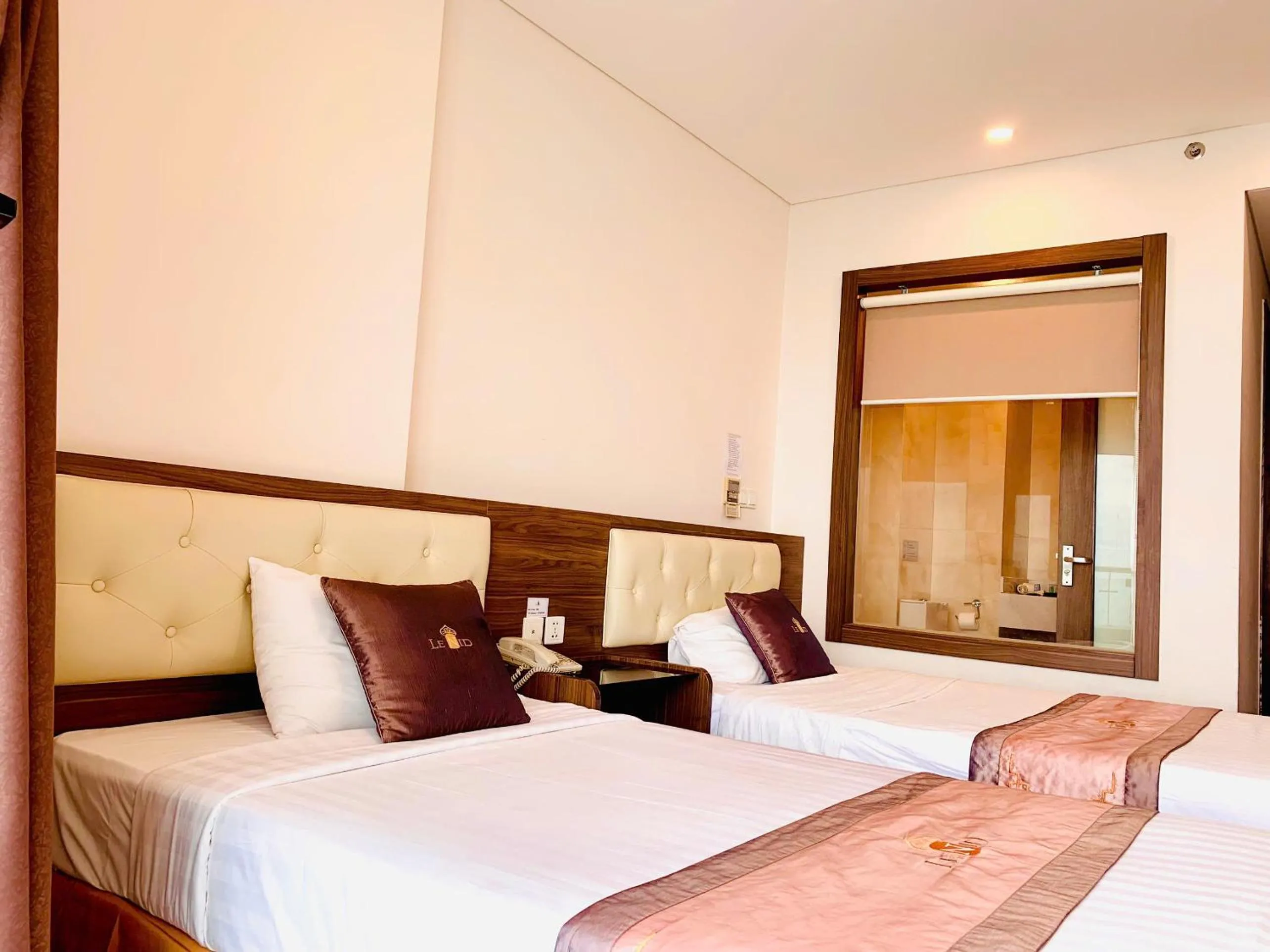 Bed in Lenid Ocean View Hotel