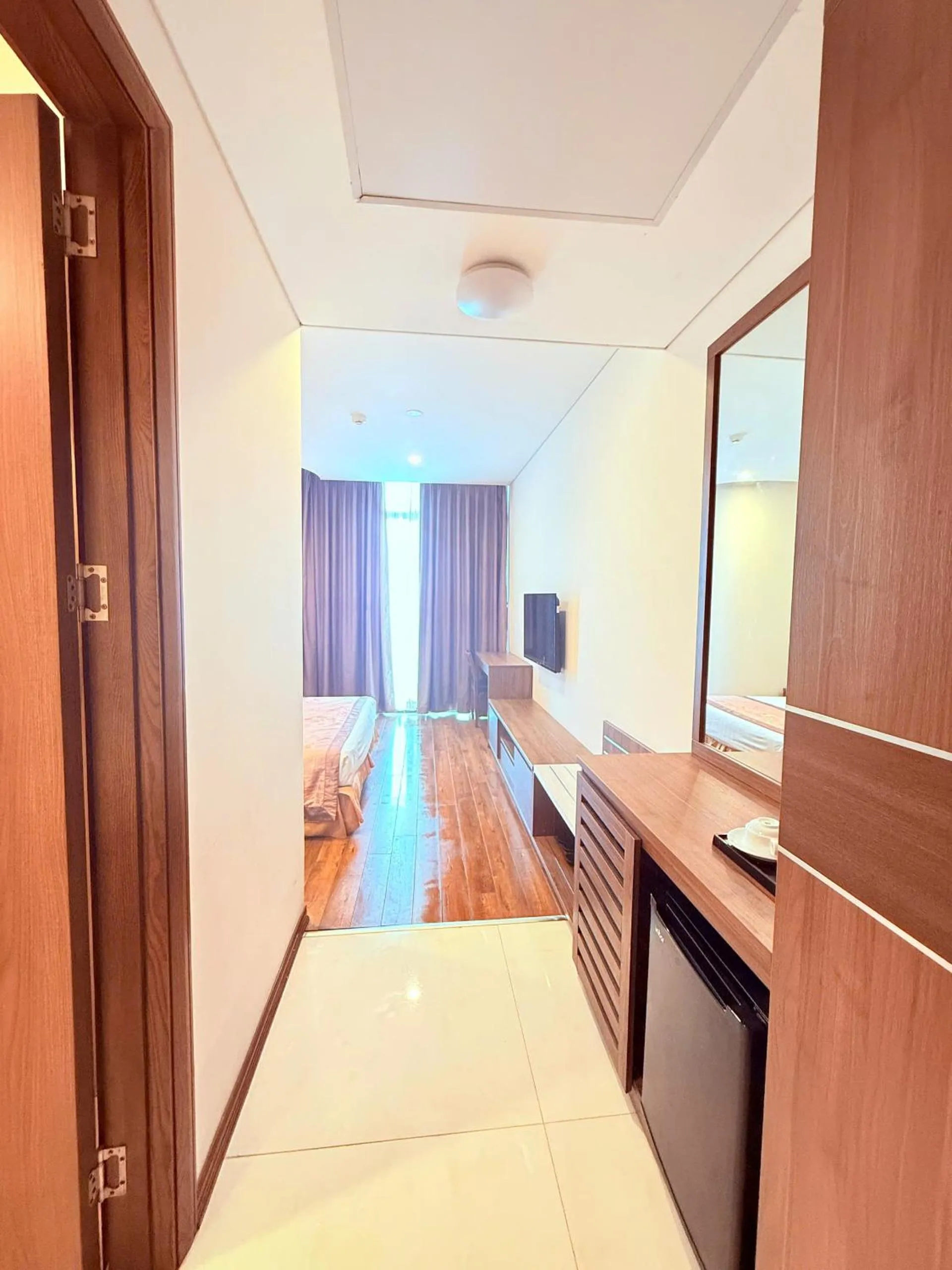 Communal lounge/ TV room, Bed in Lenid Ocean View Hotel