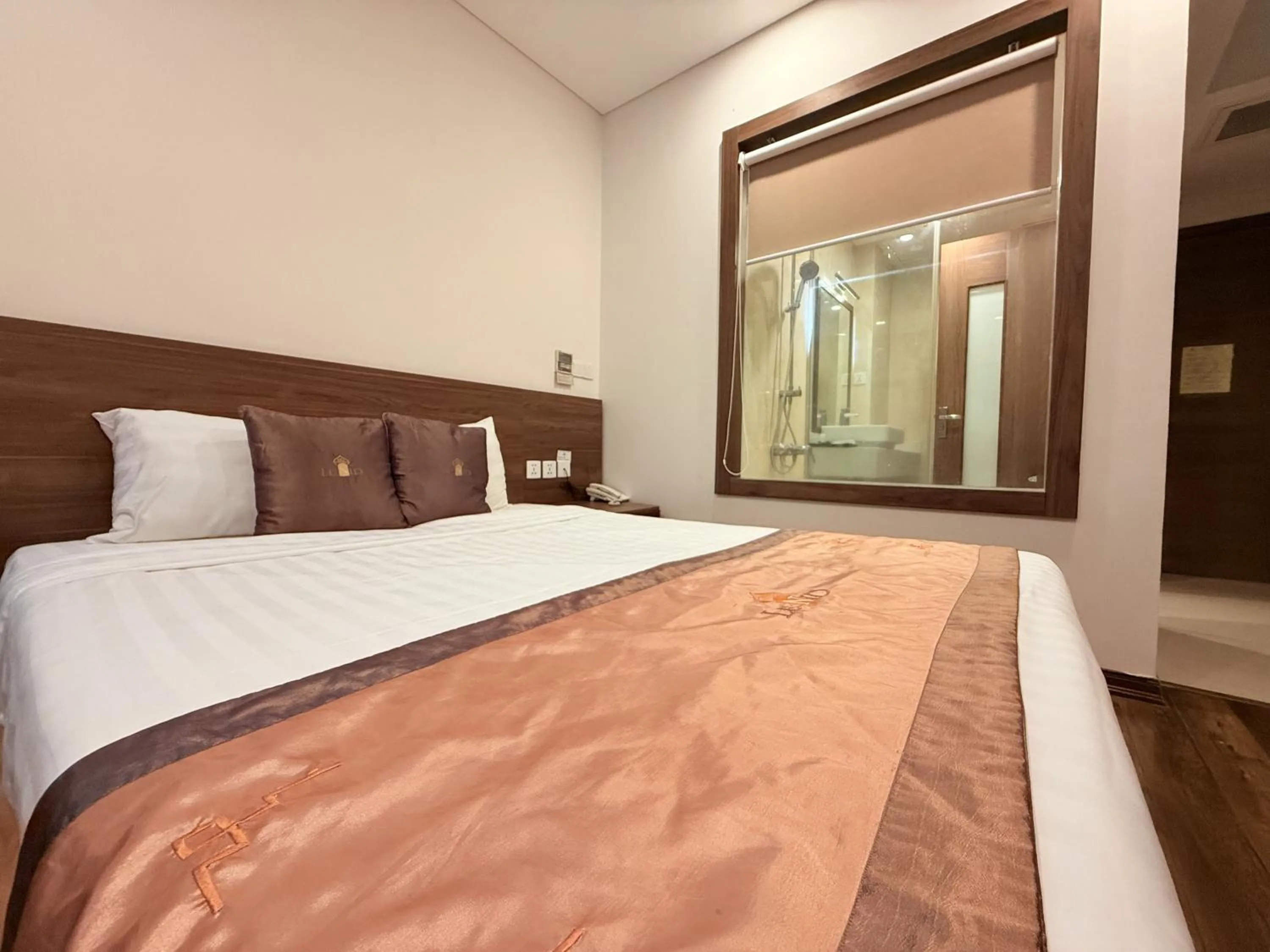 Bed in Lenid Ocean View Hotel