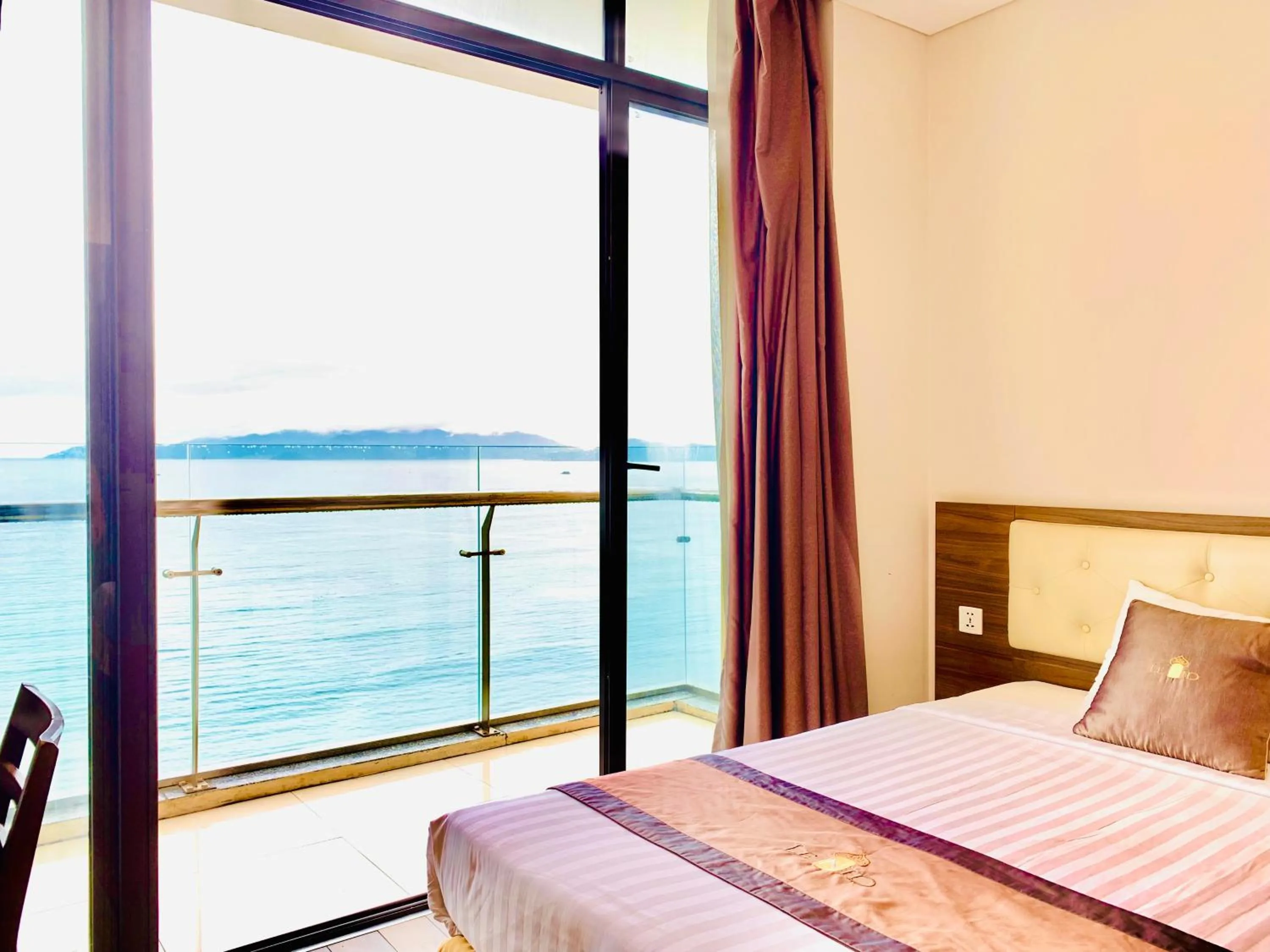 Bed in Lenid Ocean View Hotel