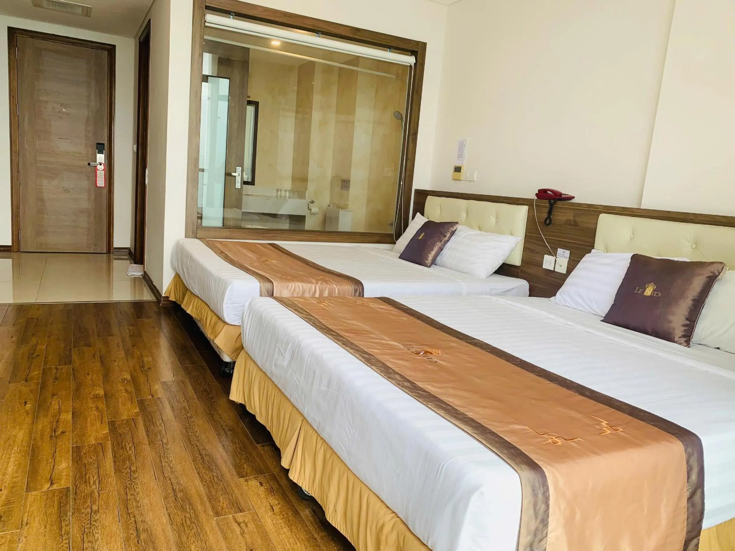 Bed in Lenid Ocean View Hotel